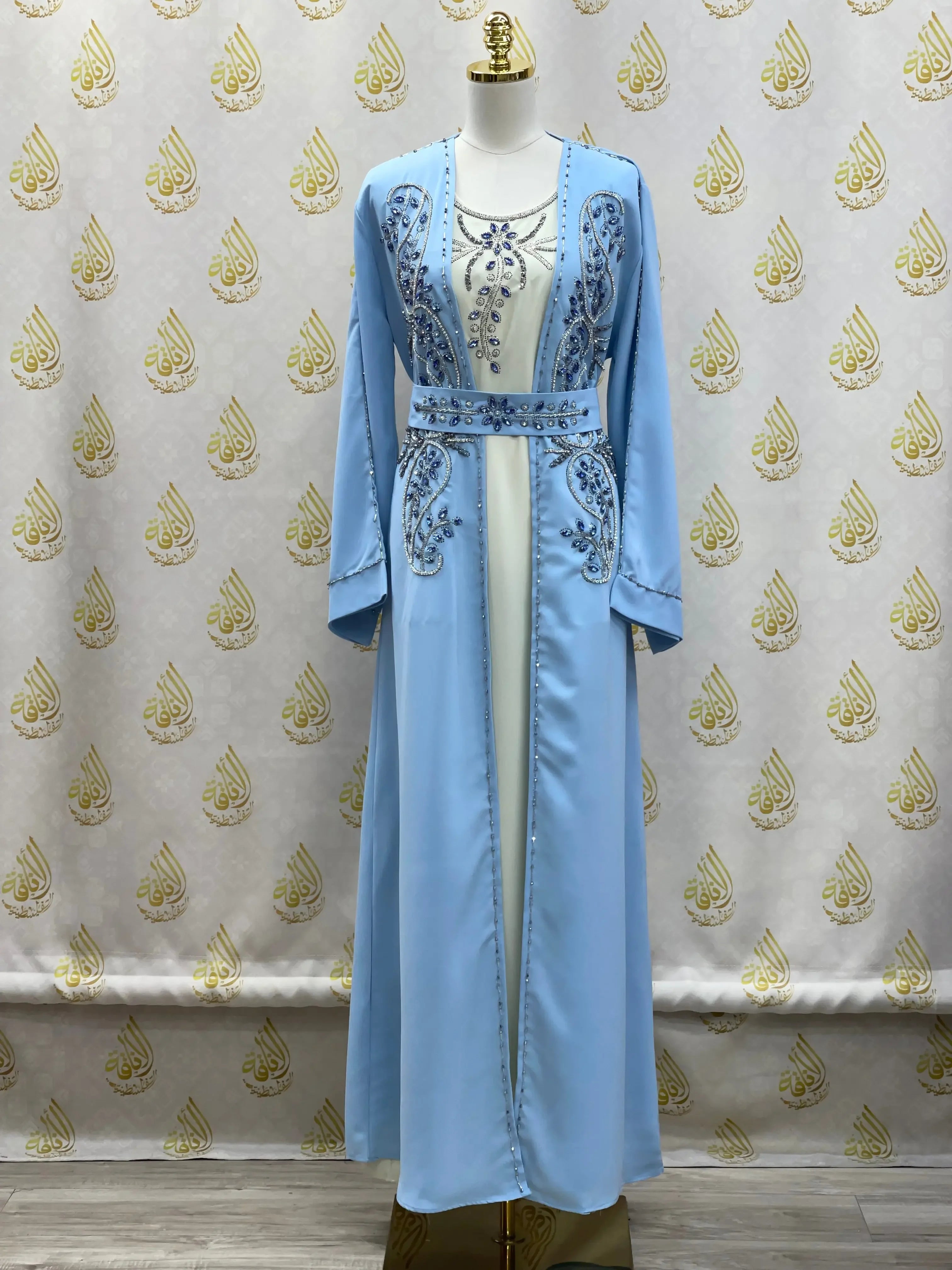 Palestinian Elegance rhinestone moroccan abaya in light blue with detailed embellishments and belt