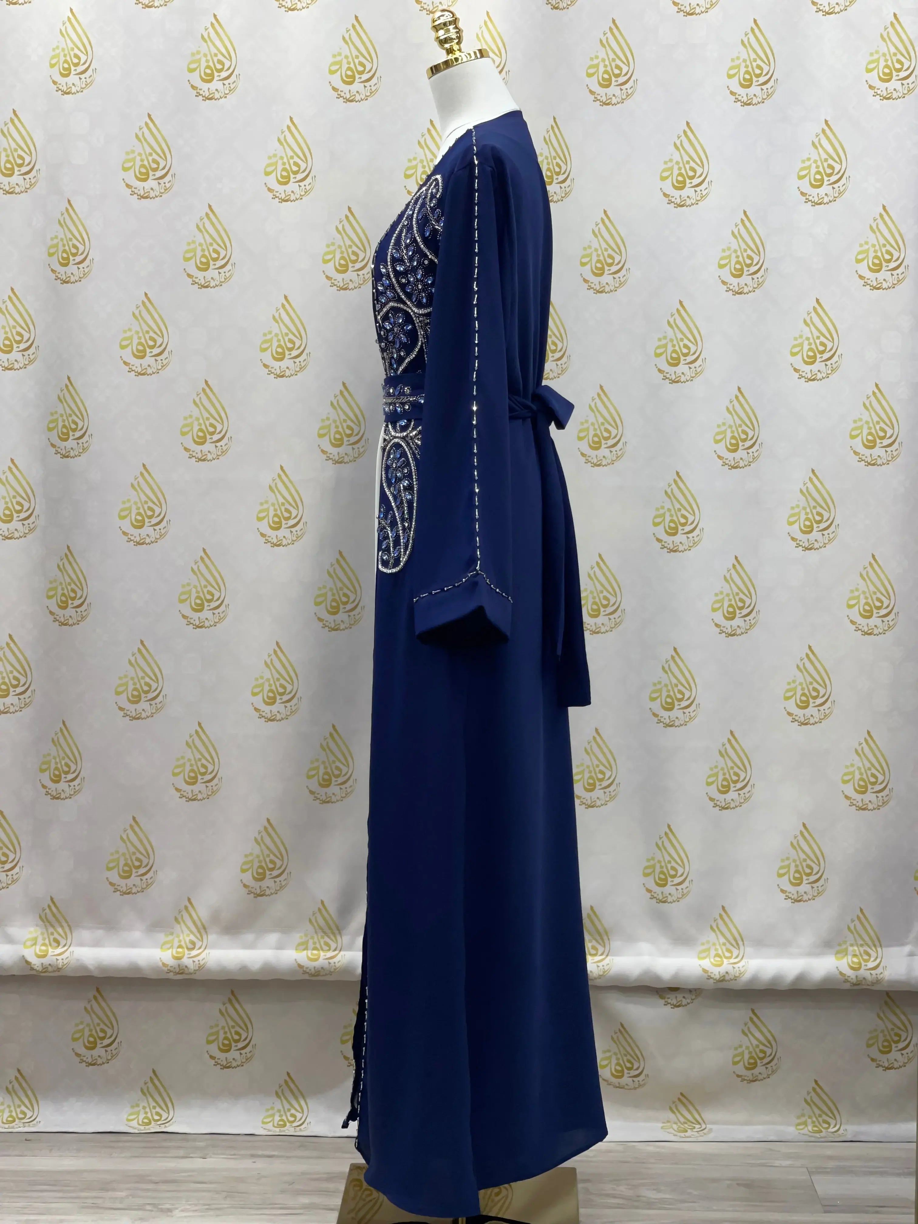 Navy blue rhinestone moroccan abaya with detailed embellishments and long sleeves from Palestinian Elegance