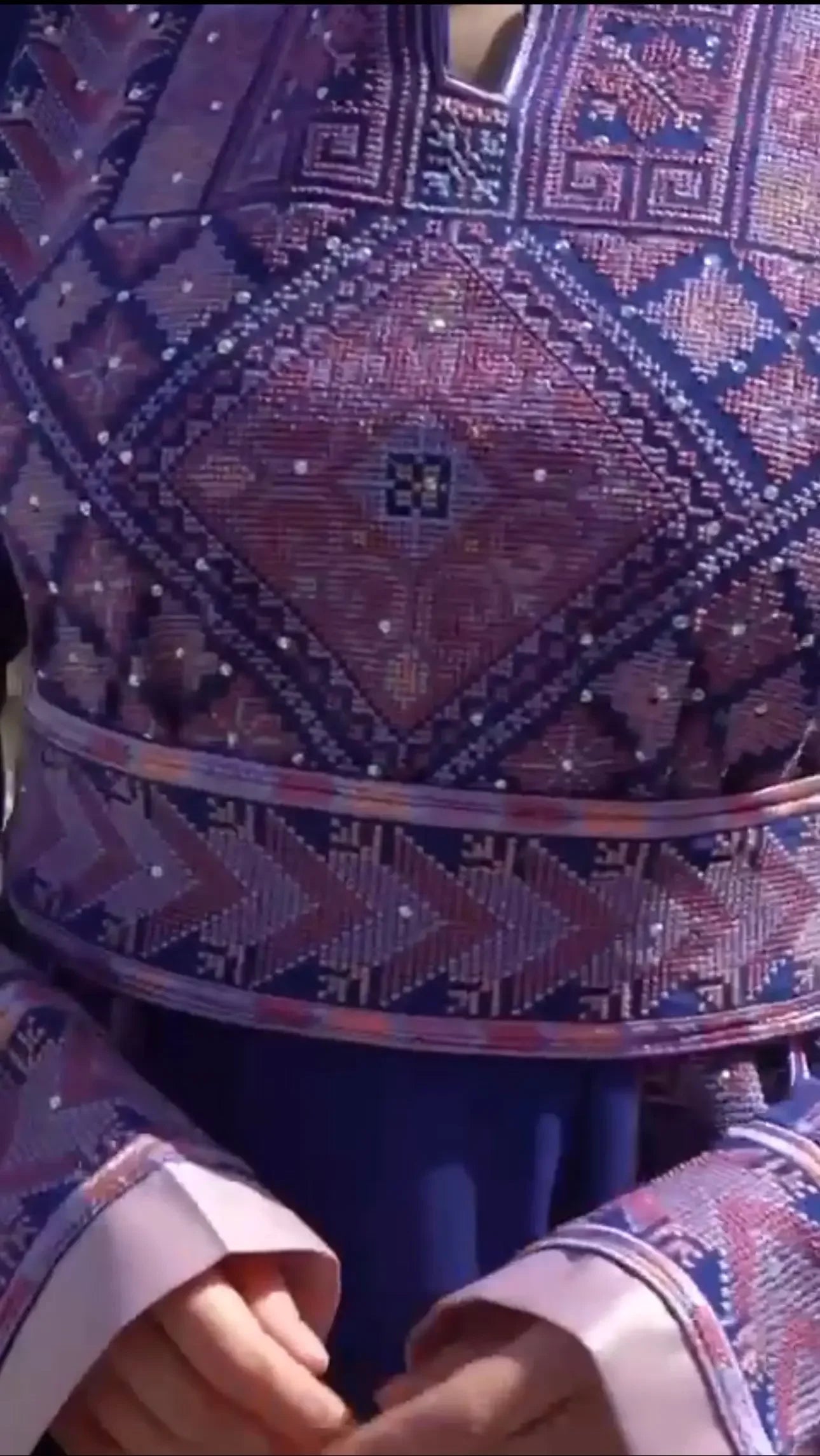 Palestinian Elegance royal blue embroidered thoub with intricate geometric patterns and detailed stitching