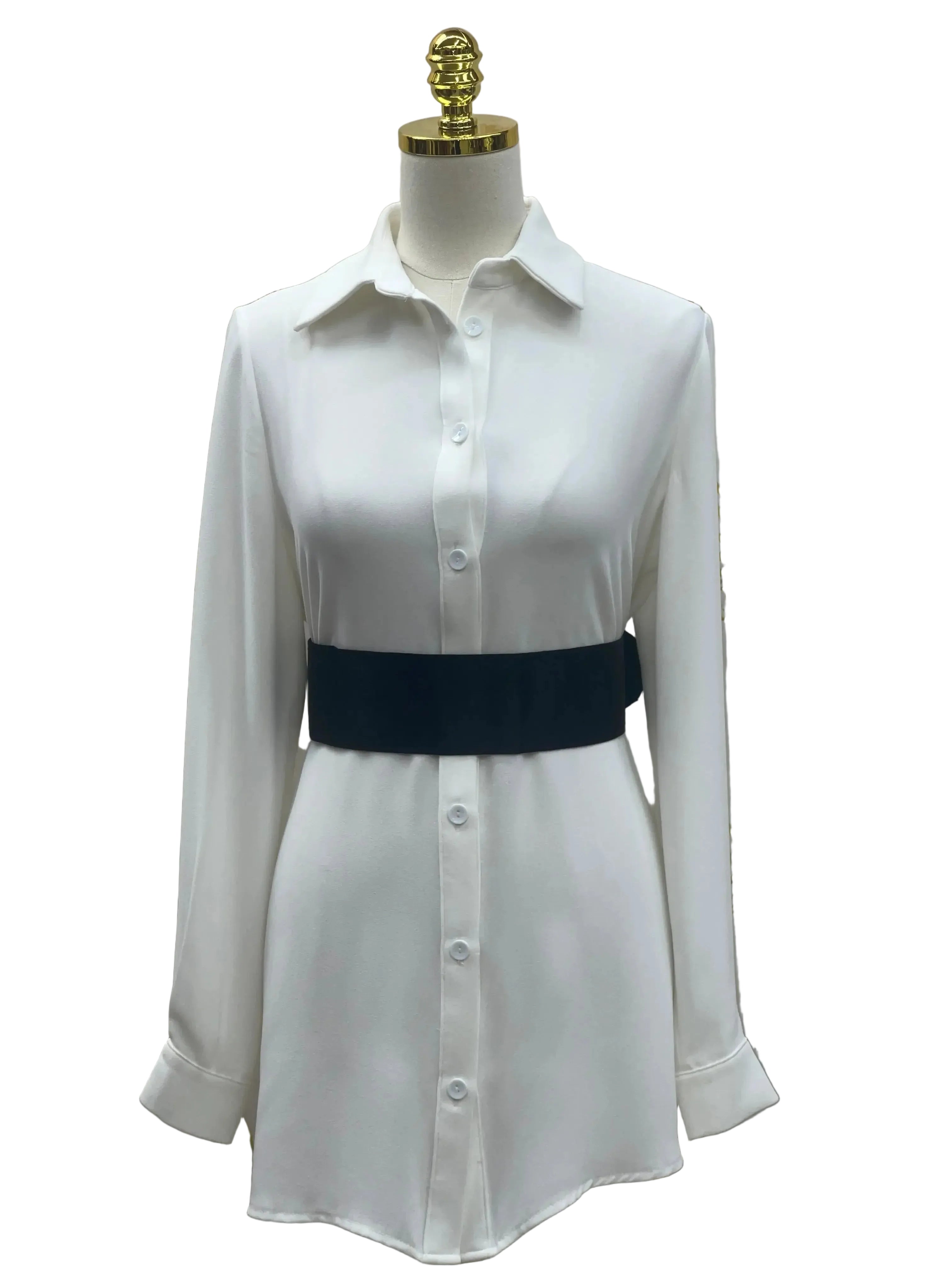 Palestinian Elegance white shirt dress styled with a black satin waist belt accessory