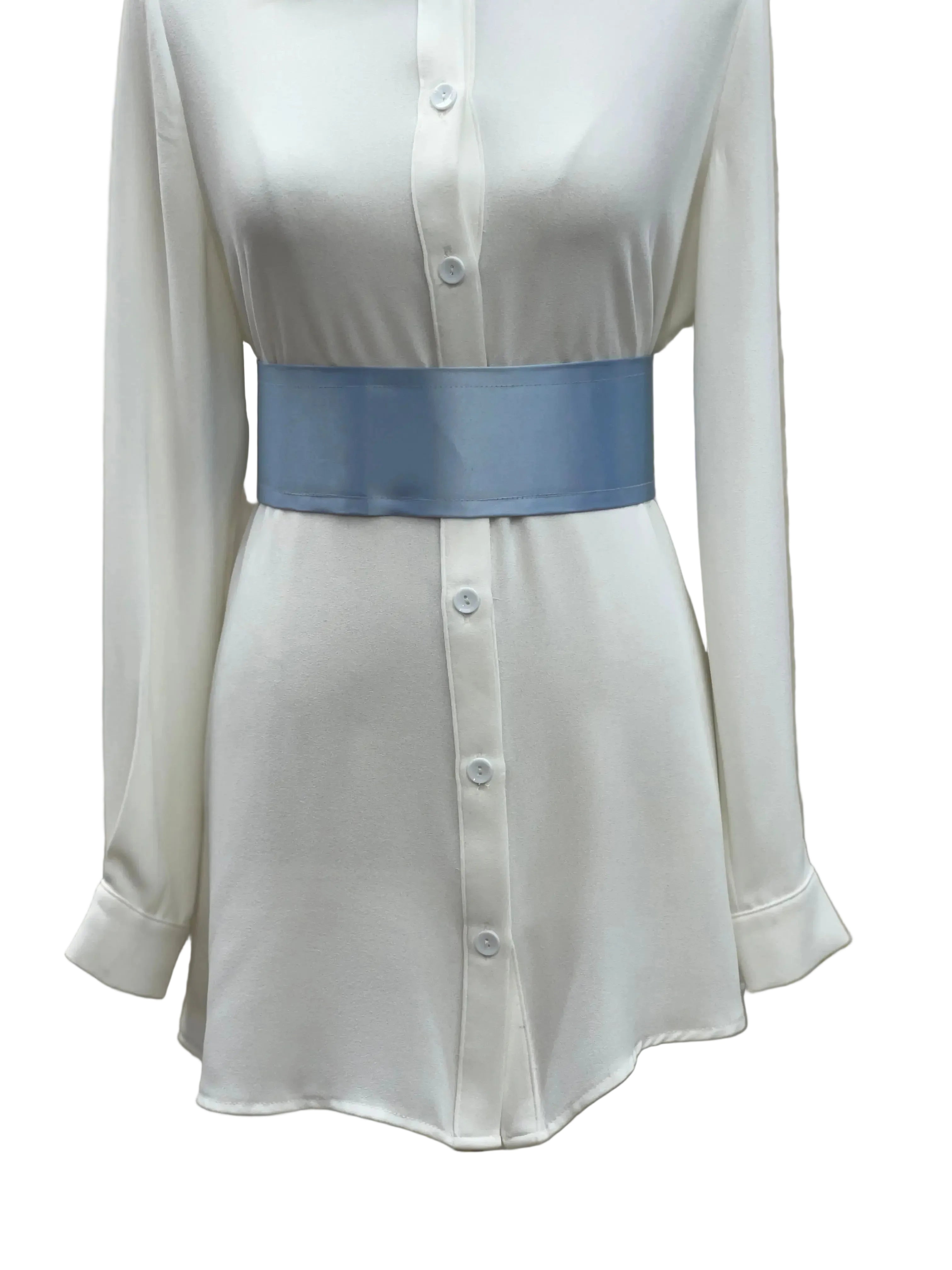 Palestinian Elegance blue satin waist belt styled over white button-down dress shirt