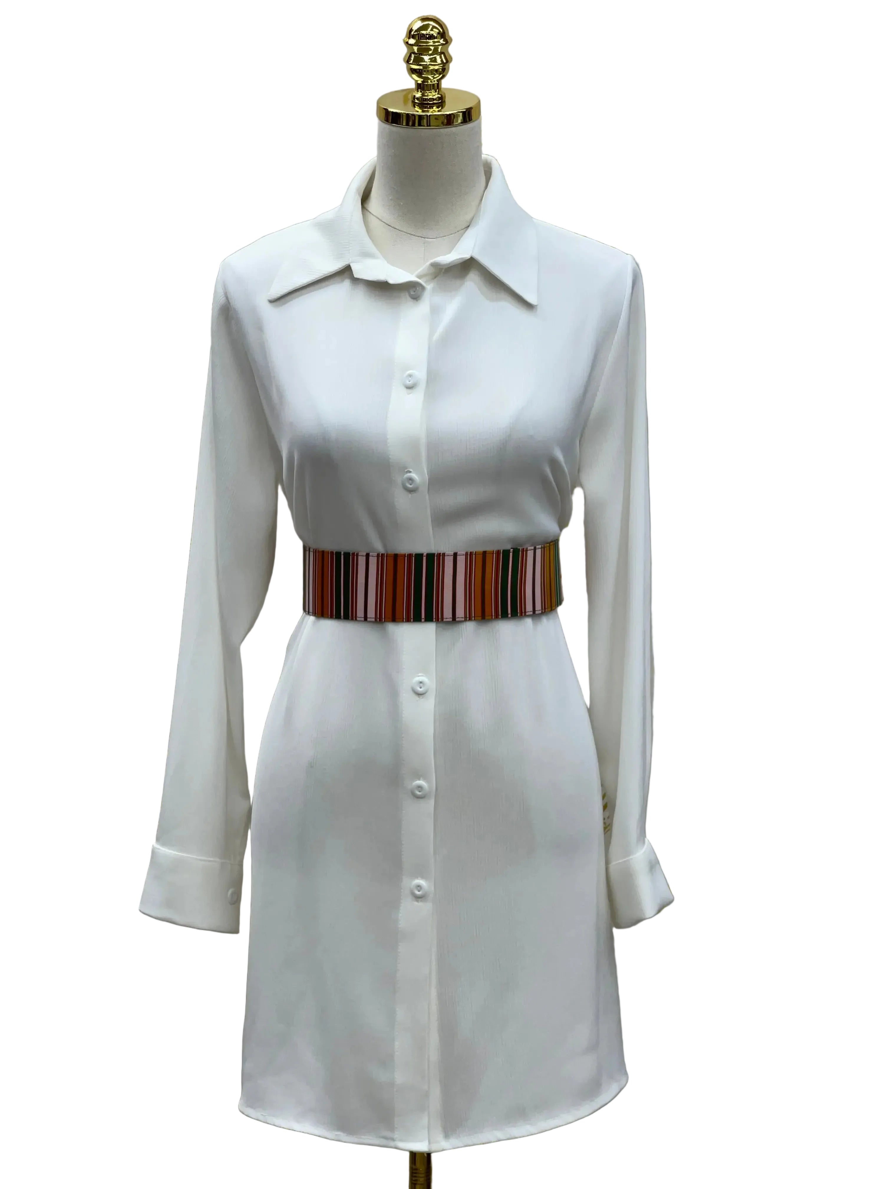 White shirt dress styled with a Palestinian Elegance satin waist belt featuring multicolor stripes