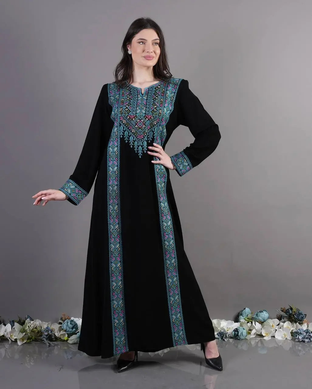 Palestinian Elegance black Tatreez Abaya Dress with intricate blue and purple embroidery details