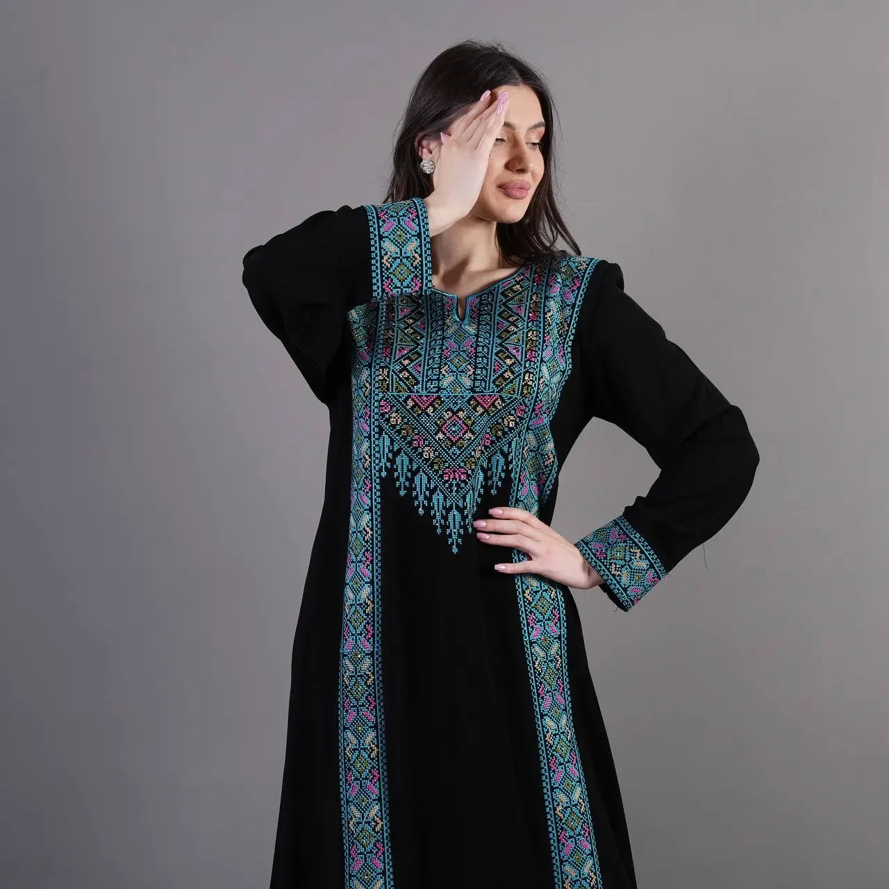 Black Tatreez Abaya Dress with detailed blue and pink embroidery from Palestinian Elegance