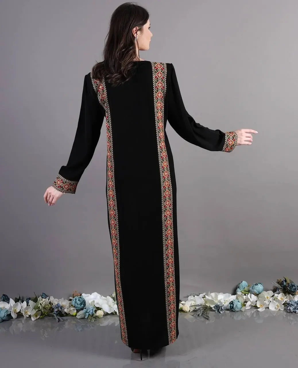 Palestinian Elegance Tatreez Abaya Dress black with intricate traditional embroidery on back and sleeves
