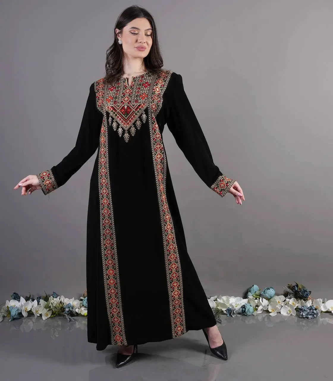 Black Palestinian Elegance Tatreez Abaya Dress with traditional embroidered patterns on front and sleeves