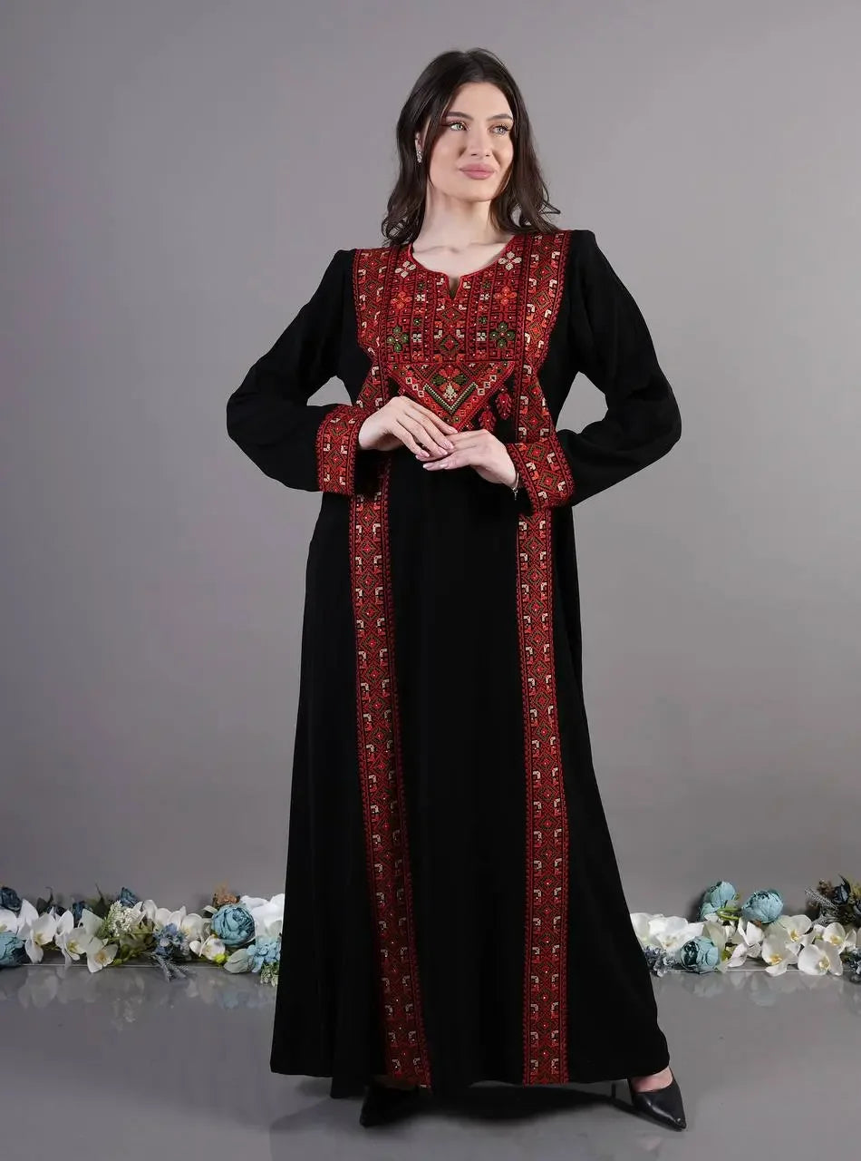 Palestinian Elegance Tatreez Abaya Dress in black with traditional red embroidery on chest and sleeves