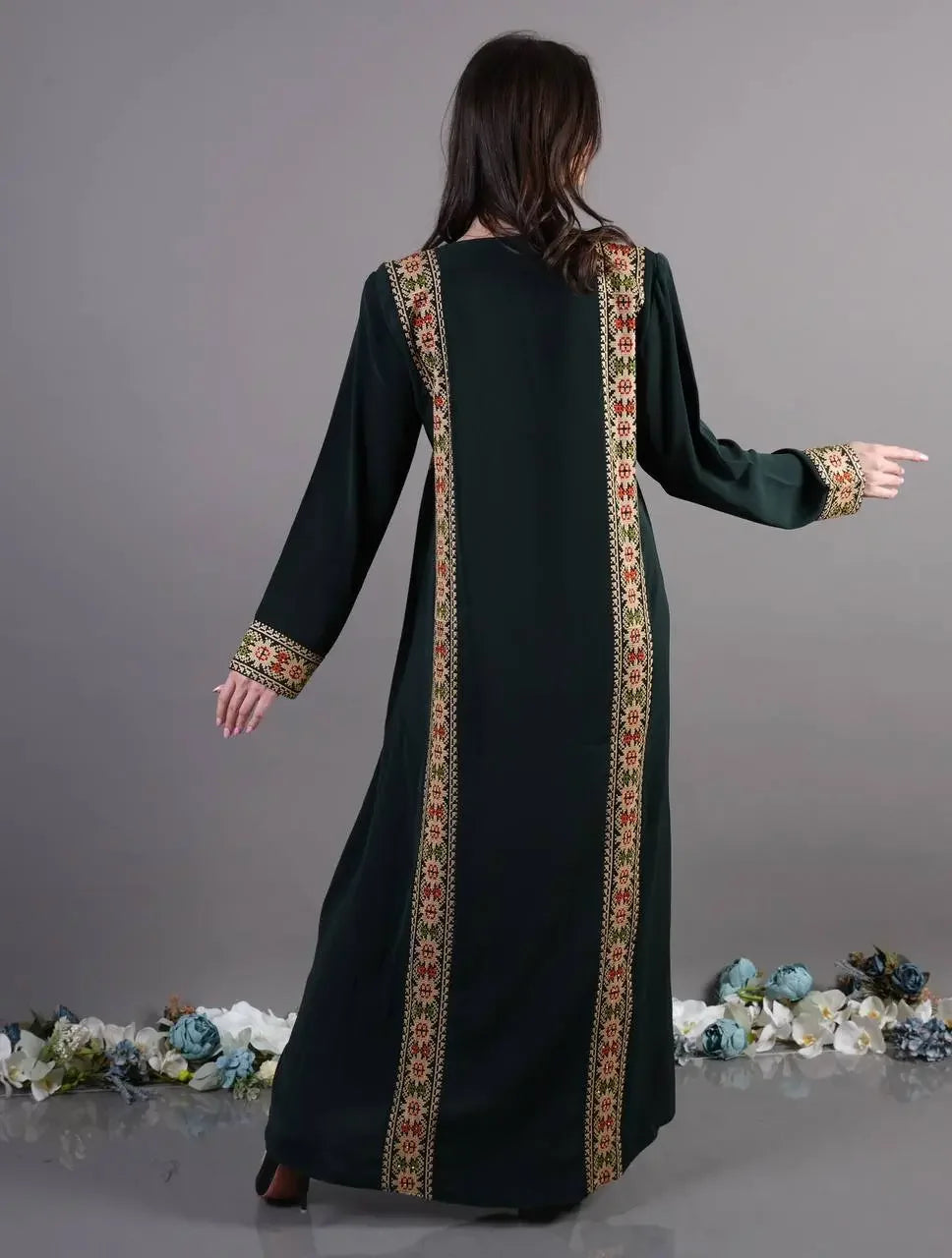 Palestinian Elegance Tatreez Abaya Dress with traditional embroidery on black fabric long sleeves