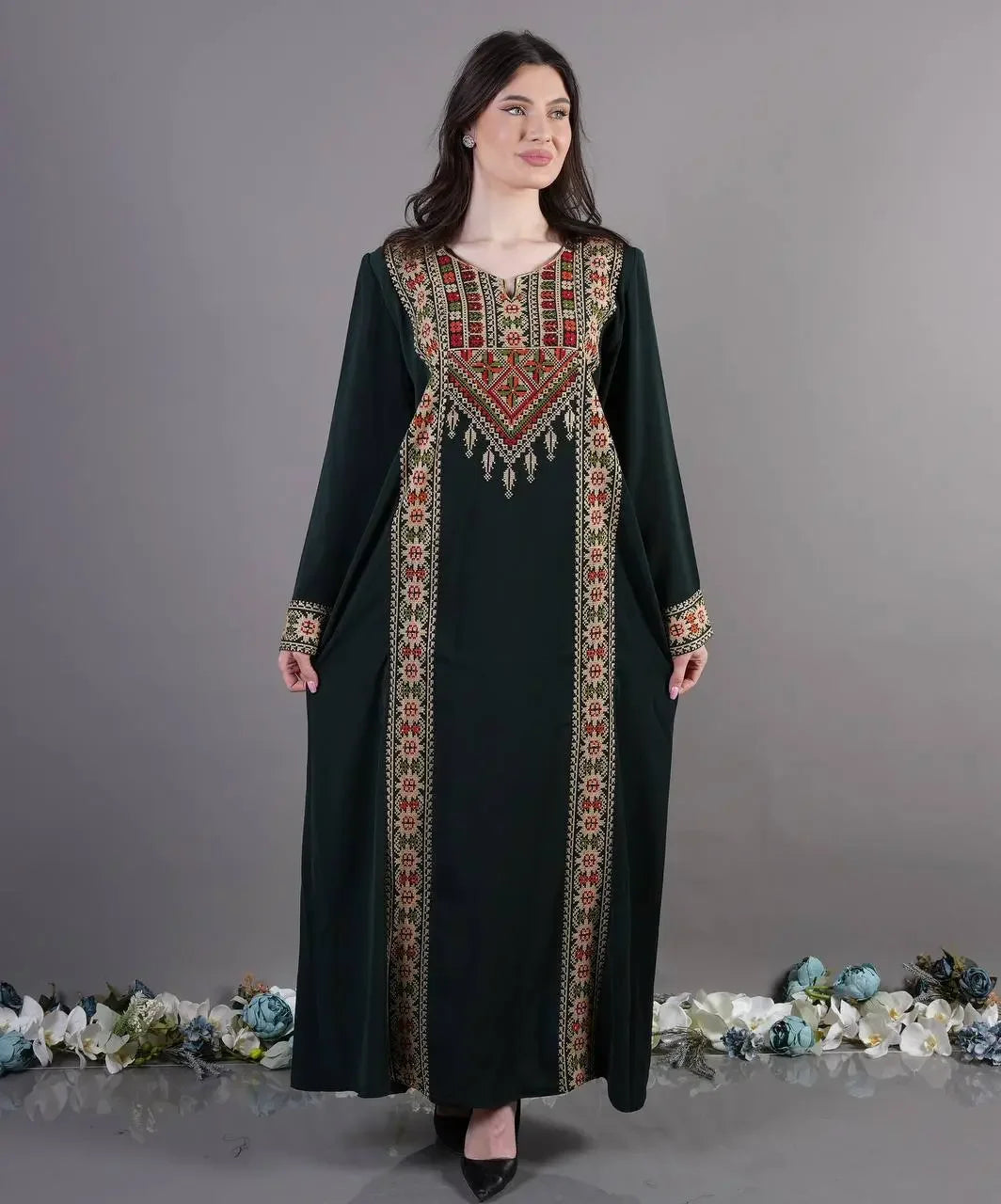 Palestinian Elegance Tatreez Abaya Dress with traditional embroidery on black fabric