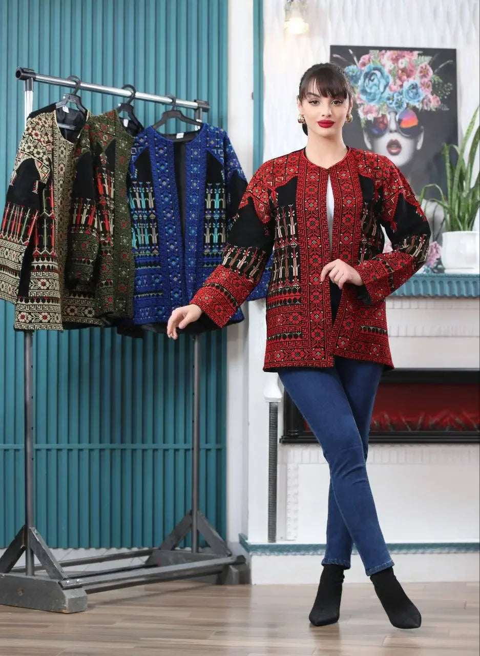 Palestinian Elegance red tatreez embroidered jacket worn by model with other color options on rack