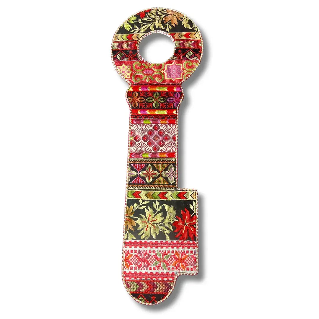 Palestinian Elegance tatreez key accessory with intricate traditional embroidered patterns