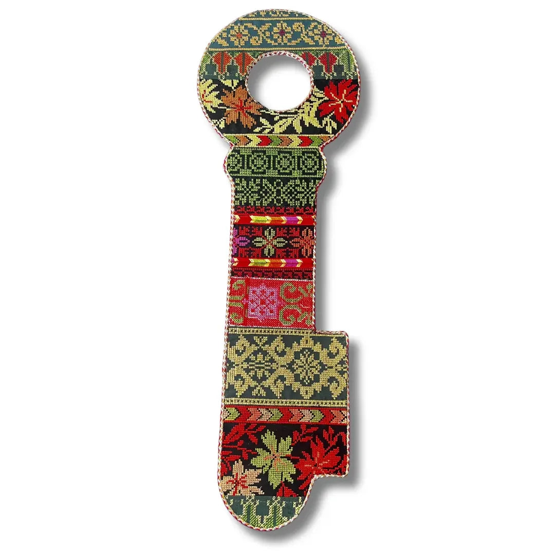 Colorful tatreez key accessory featuring traditional Palestinian embroidery patterns