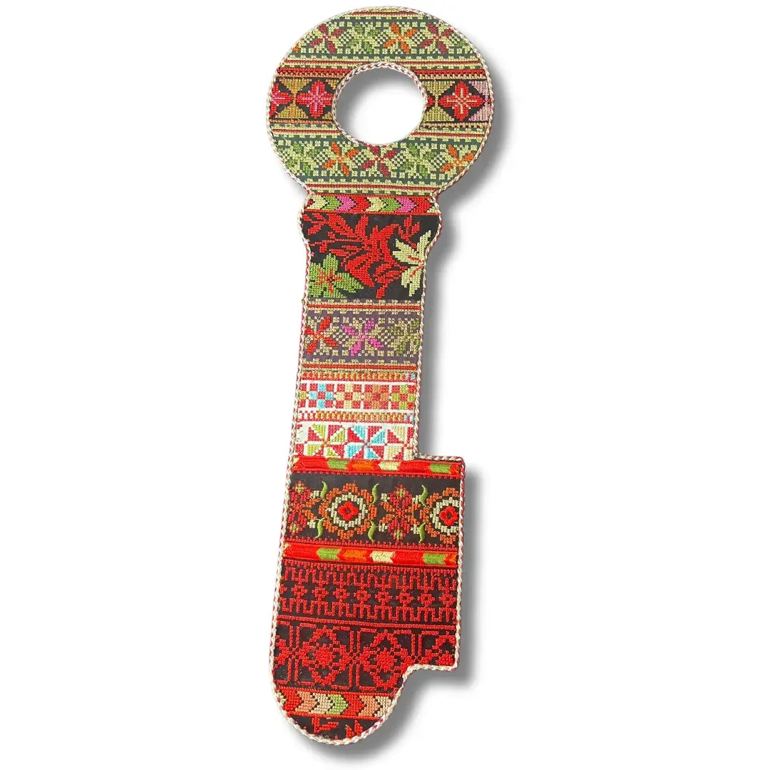 Palestinian Elegance tatreez key accessory with intricate traditional embroidery patterns