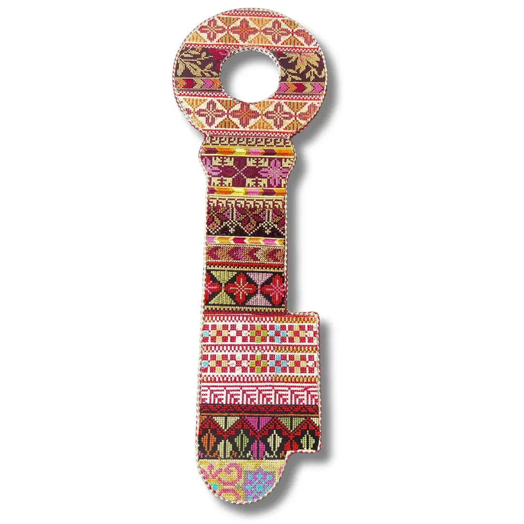 Colorful Palestinian Elegance tatreez key accessory with traditional embroidered patterns