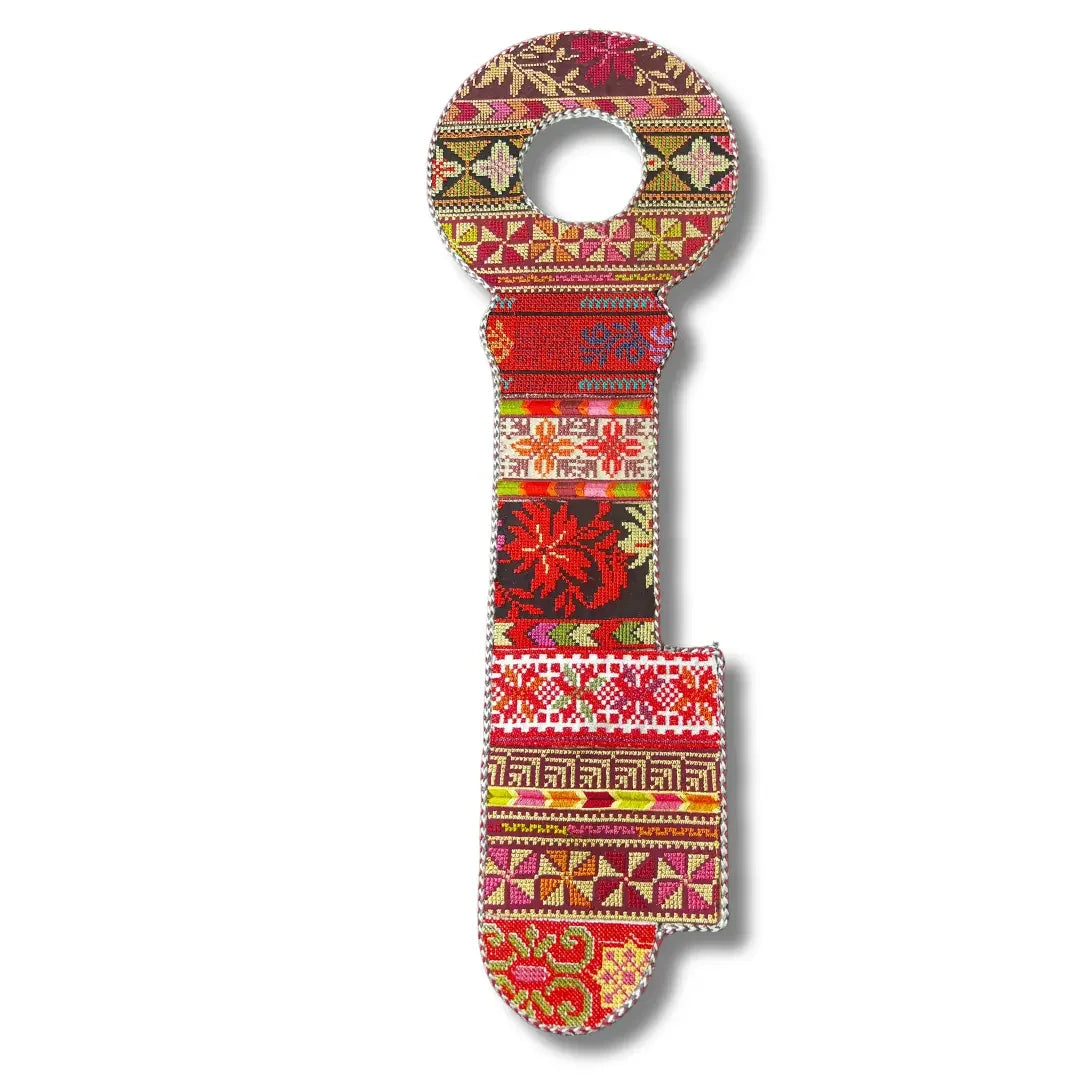 Palestinian Elegance tatreez key accessory with colorful traditional embroidered patterns
