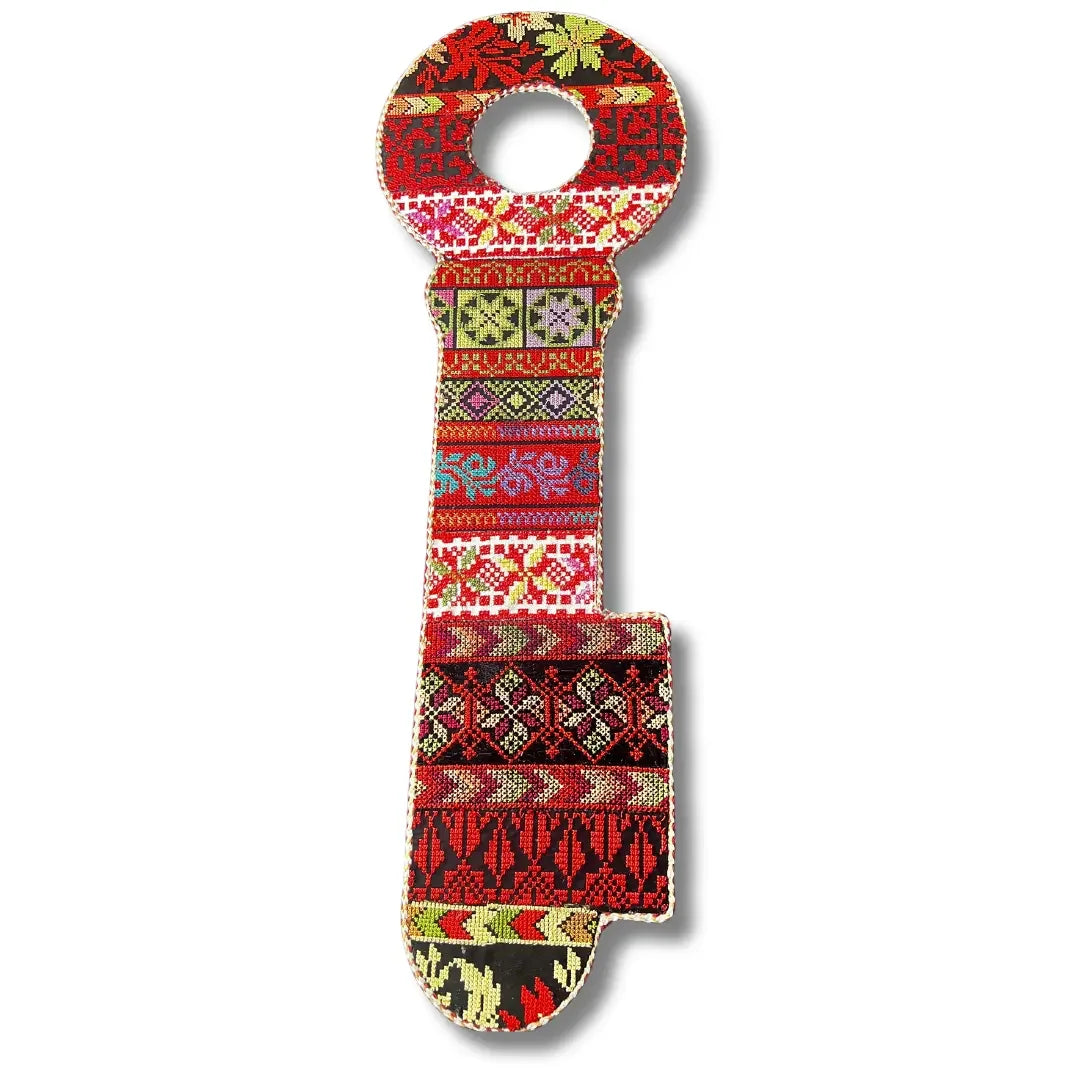 Colorful Palestinian Elegance tatreez key accessory with traditional embroidery patterns