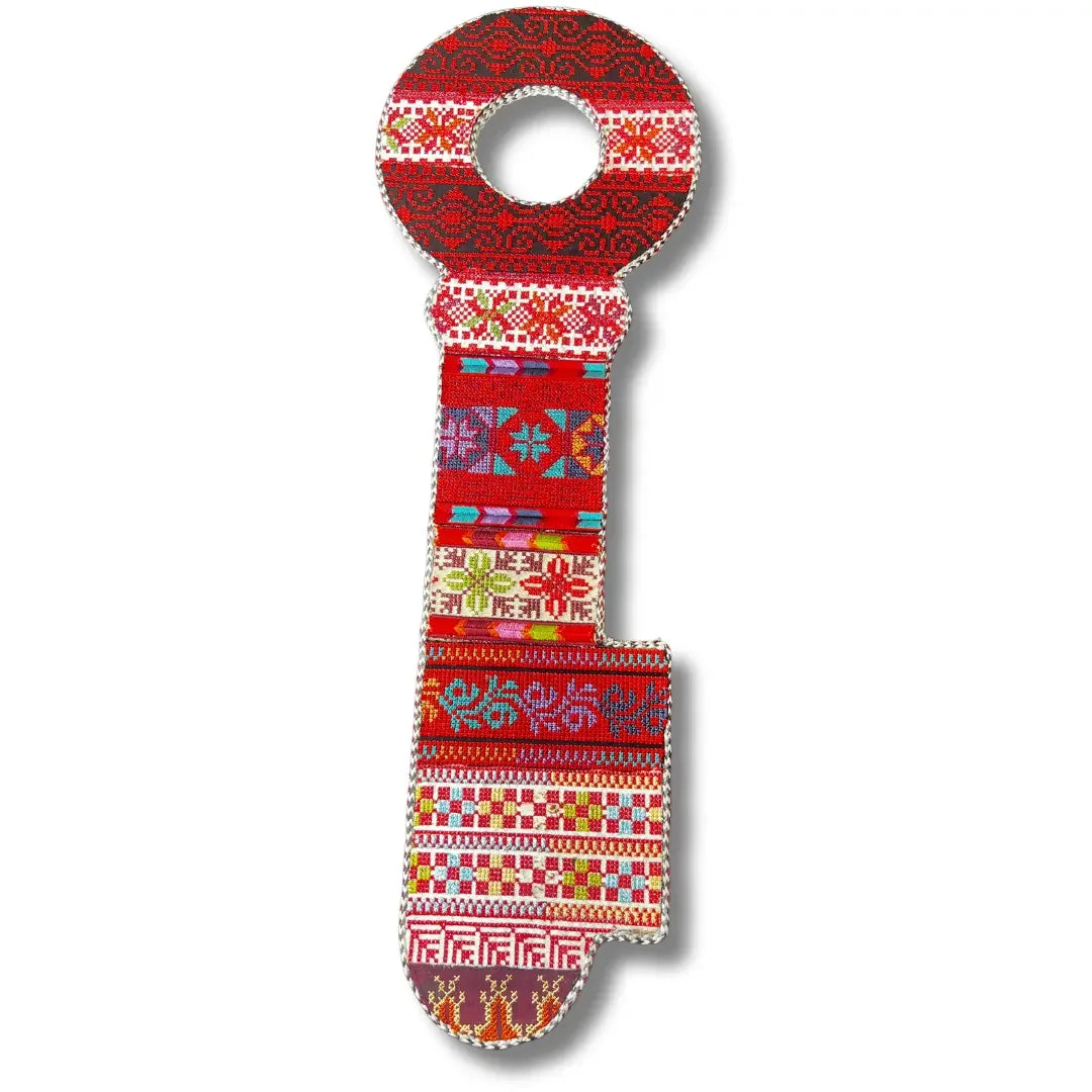 Palestinian Elegance tatreez key accessory with traditional red and multicolor embroidered patterns
