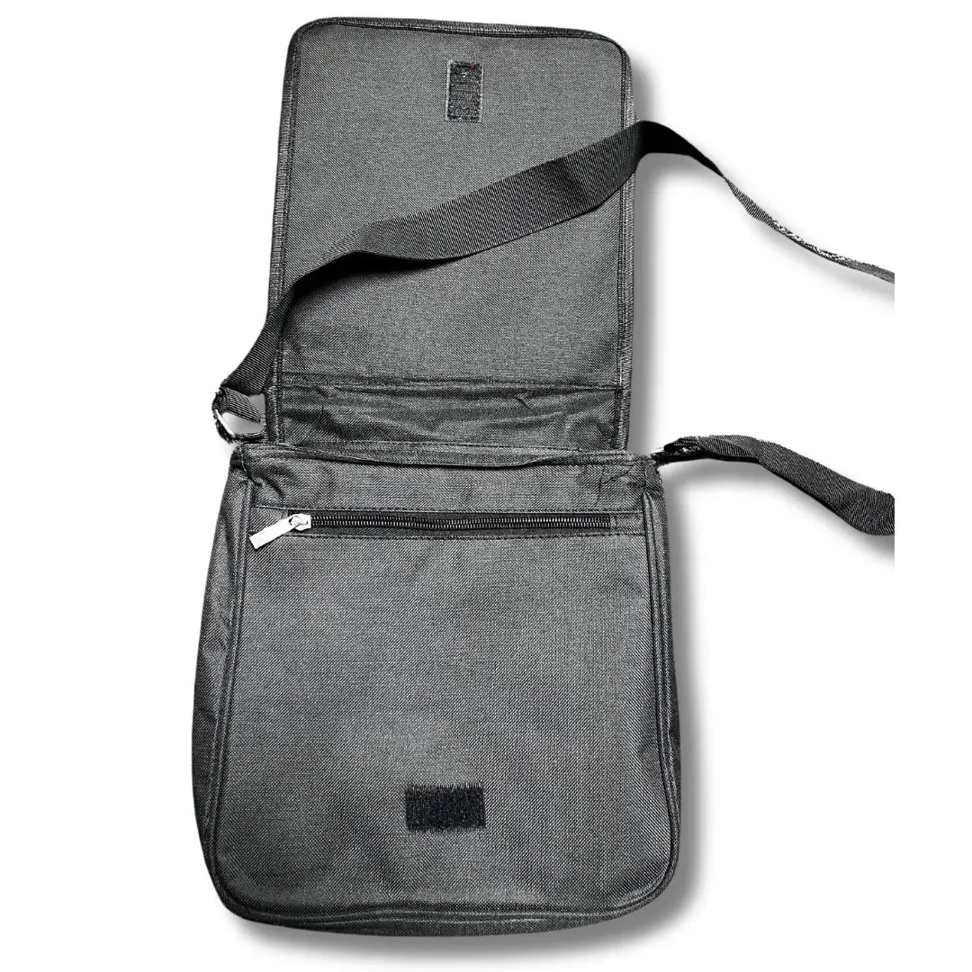 Open black Tatreez shoulder bag by Palestinian Elegance with adjustable strap and zippered pocket