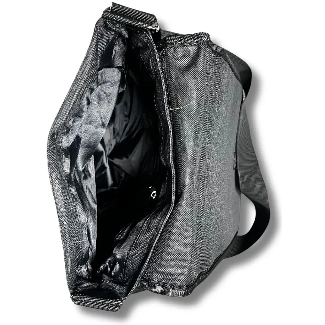 Open black Tatreez shoulder bag showing spacious interior and adjustable strap by Palestinian Elegance