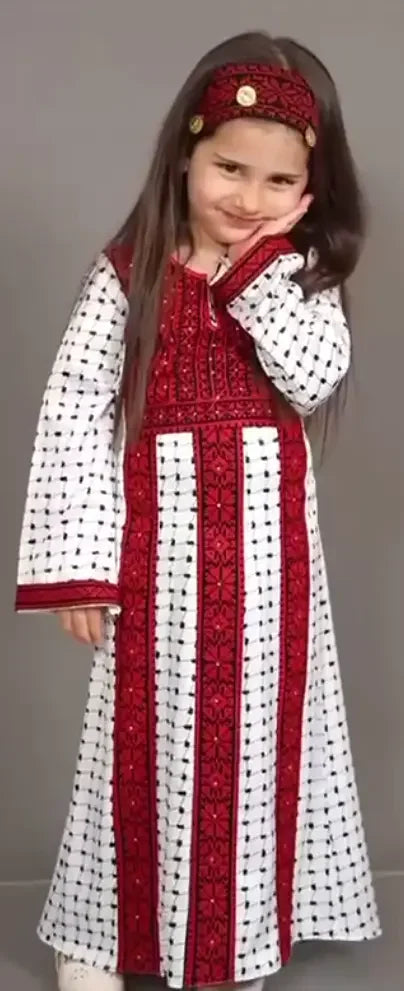 Palestinian Elegance teen girl abaya dress with intricate red embroidery on white fabric