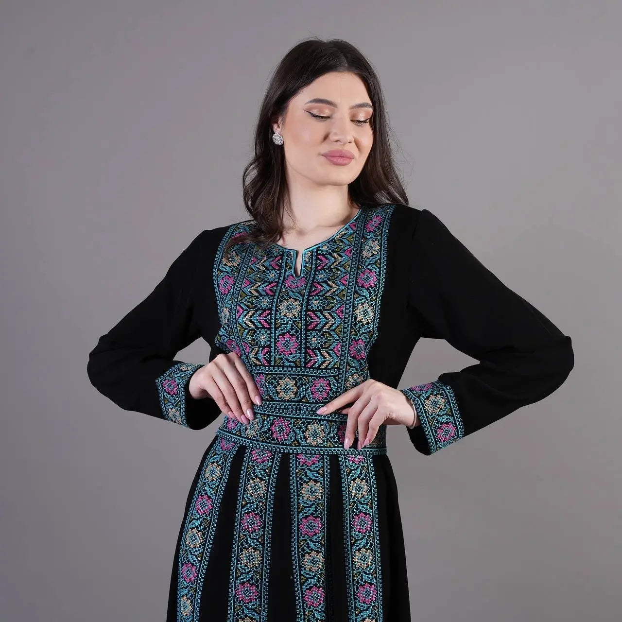 Palestinian Elegance Traditional Embroidered Abaya in black with colorful floral and geometric patterns