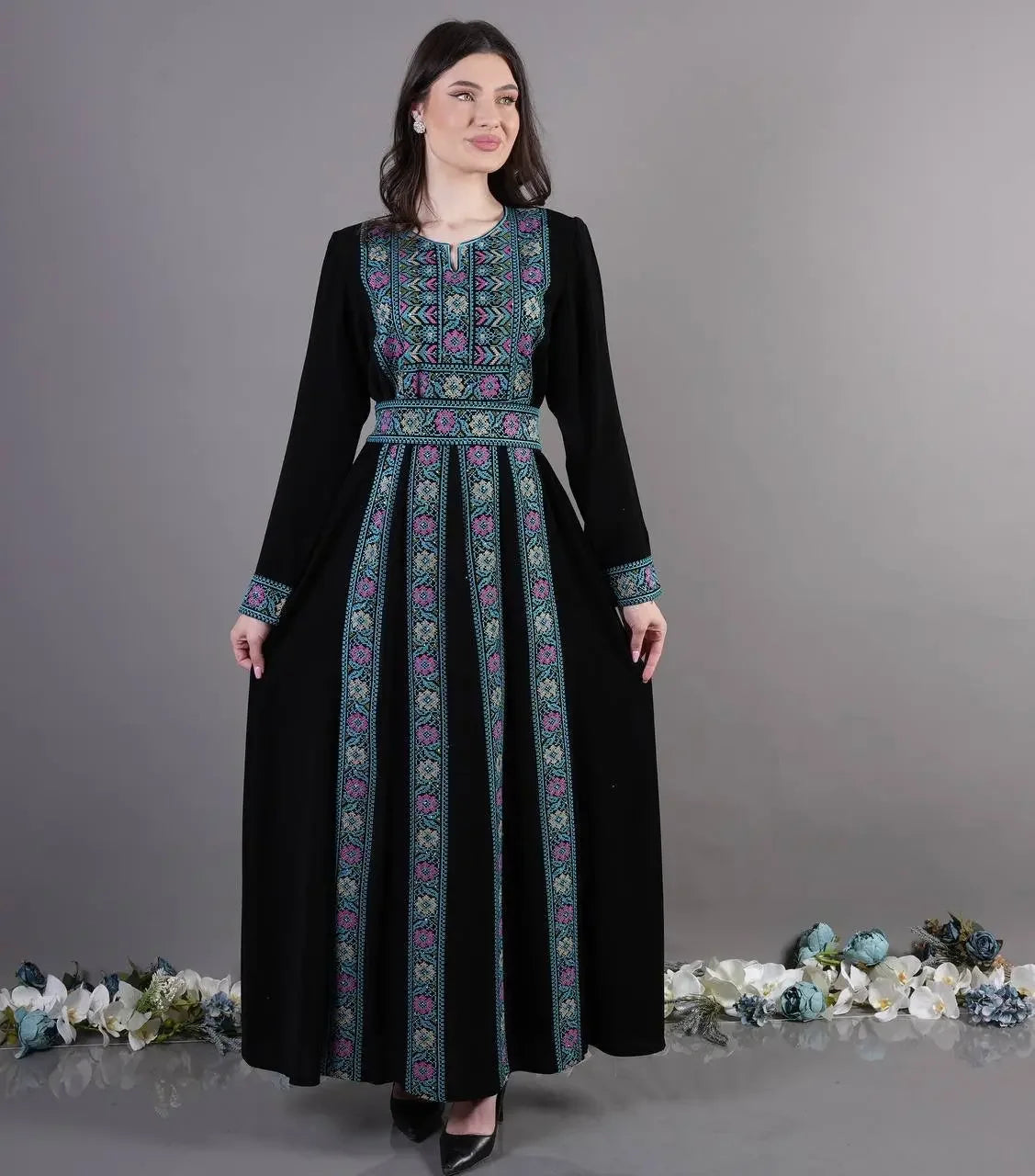 Palestinian Elegance traditional embroidered abaya in black with colorful floral embroidery and long sleeves