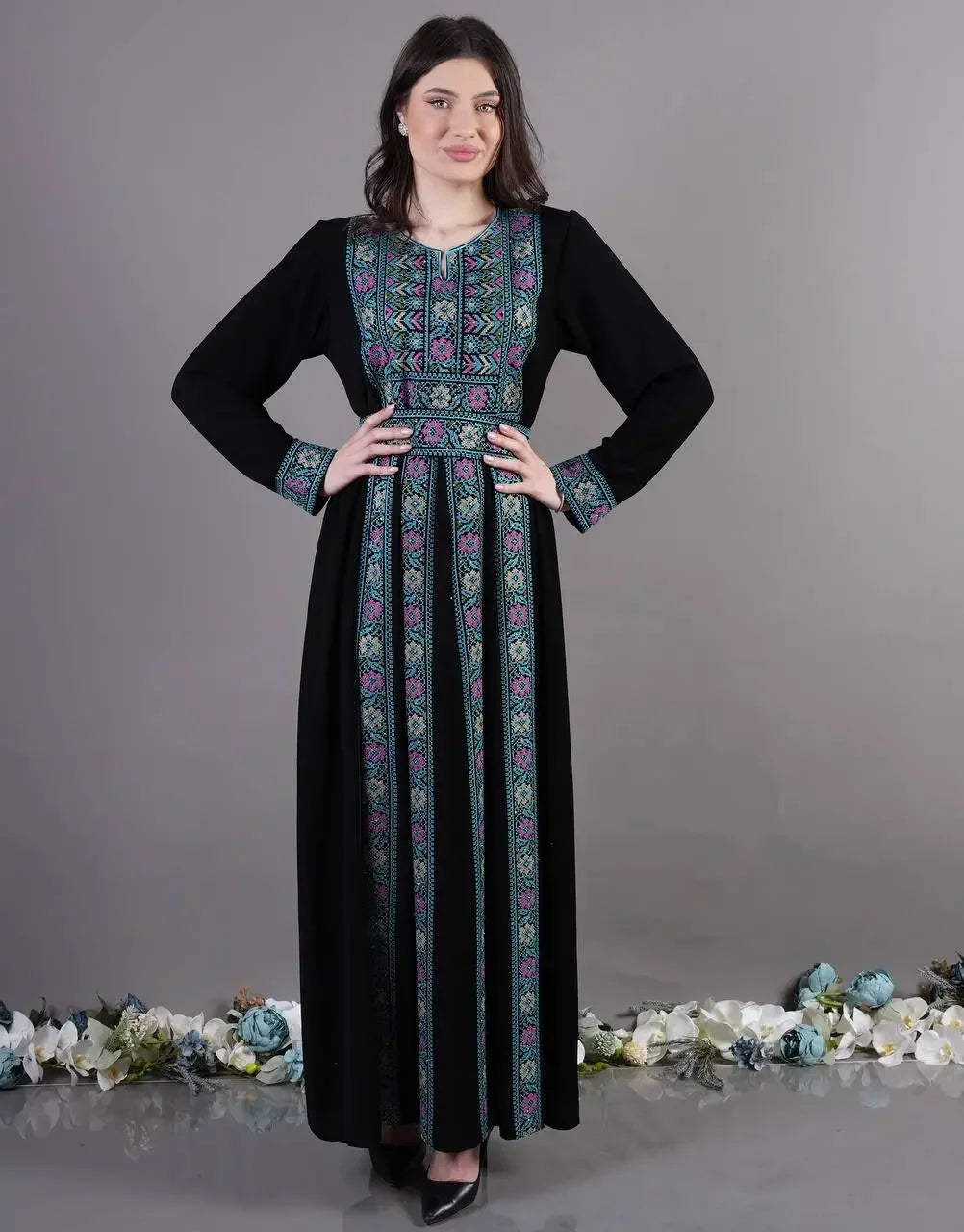 Palestinian Elegance Traditional Embroidered Abaya in black with colorful floral embroidery on front and cuffs