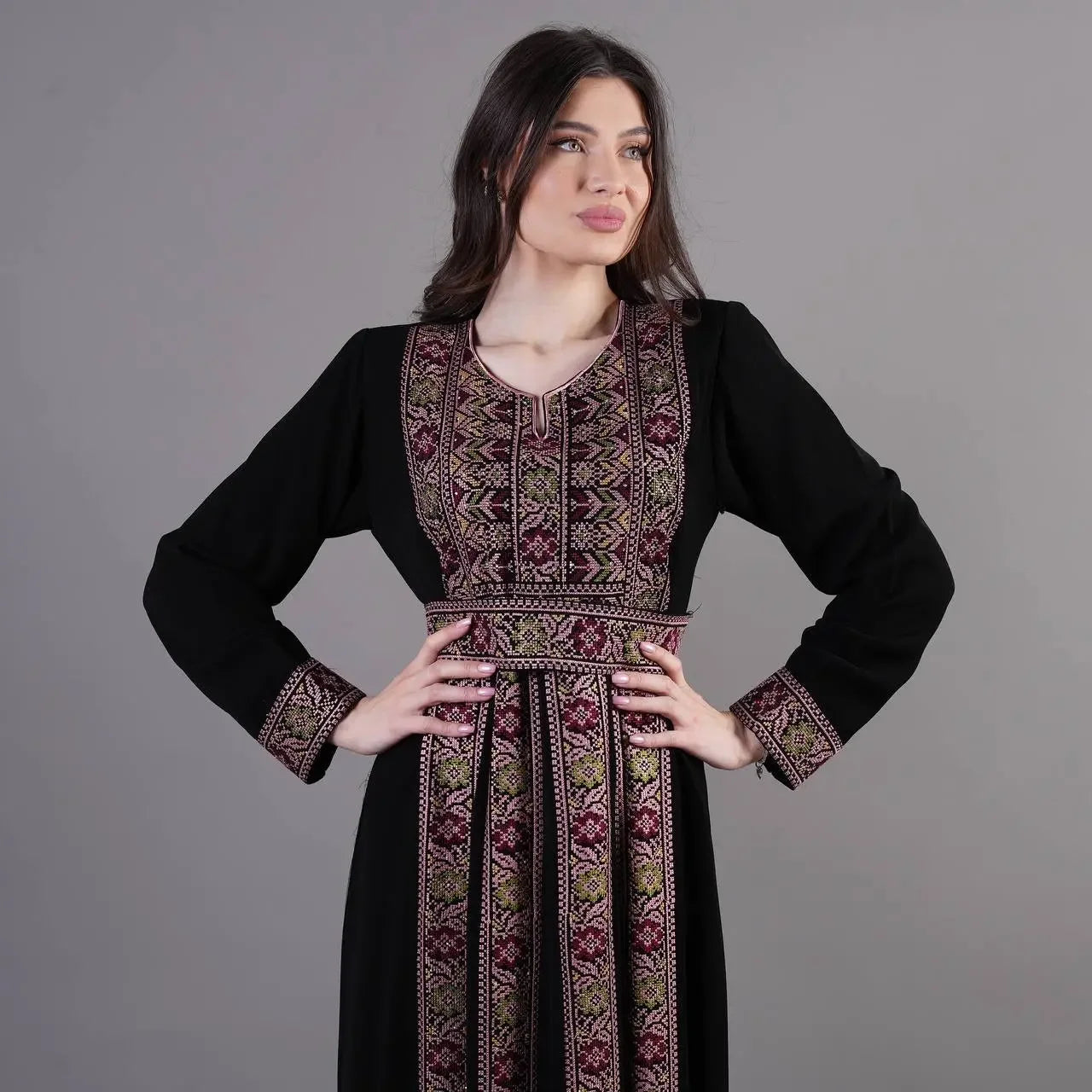 Palestinian Elegance Traditional Embroidered Abaya in black with intricate multicolor embroidery on bodice and sleeves