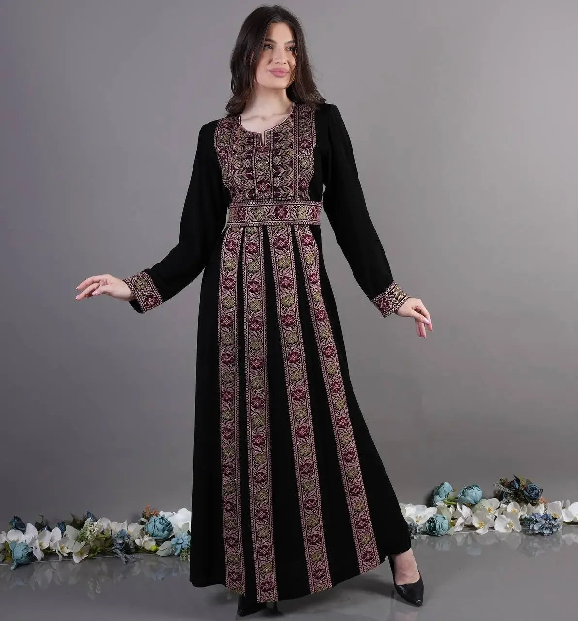 Palestinian Elegance Traditional Embroidered Abaya in black with intricate floral embroidery on front and sleeves