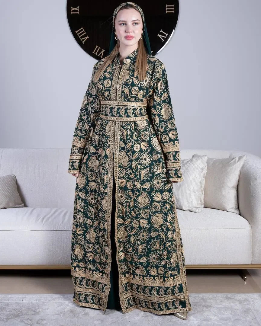 Palestinian Elegance traditional embroidered kaftan with intricate floral patterns in green and gold