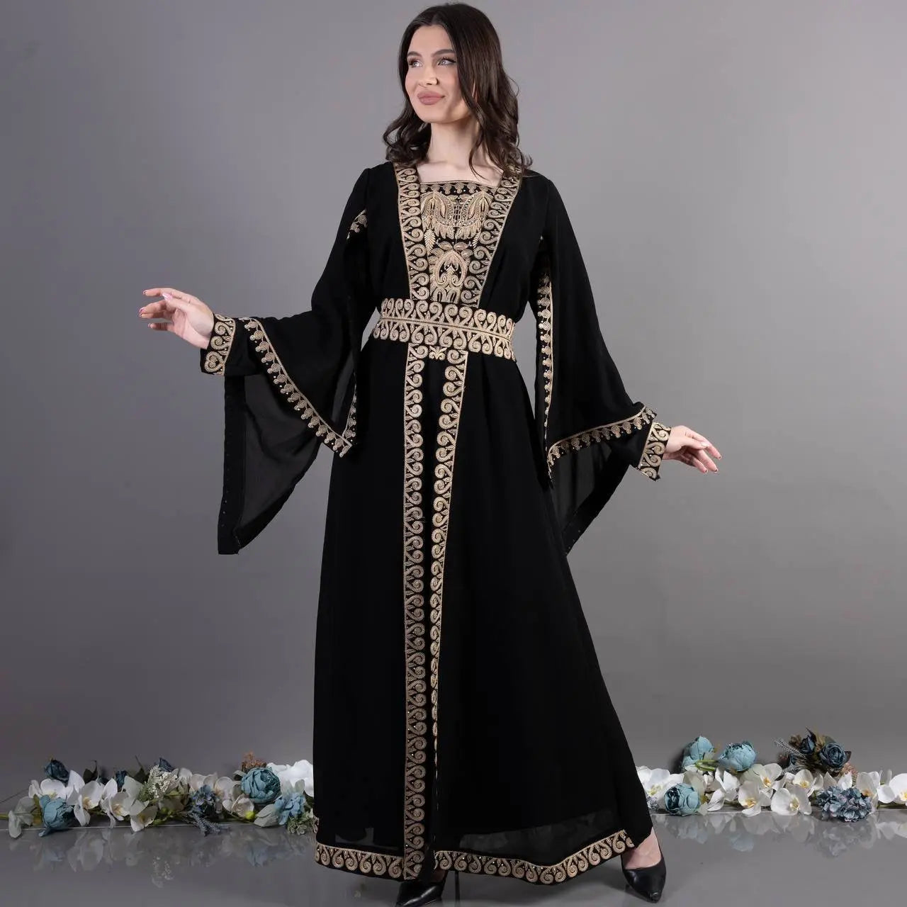 Black traditional embroidery kaftan with gold intricate patterns by Palestinian Elegance