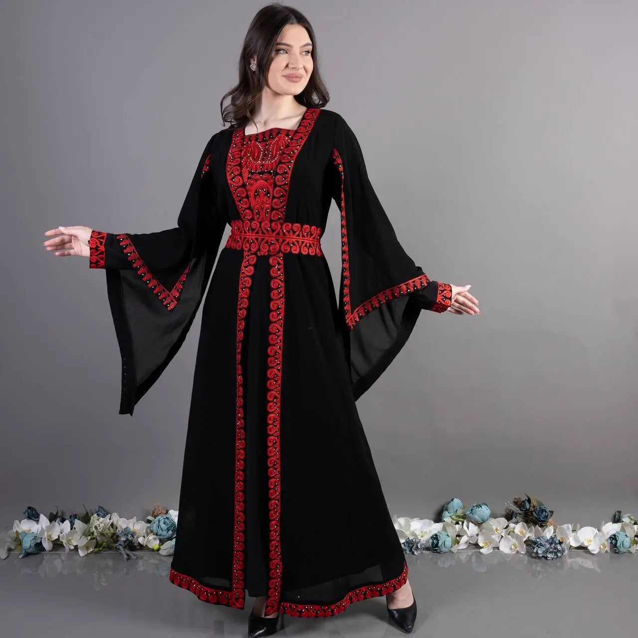 Palestinian Elegance traditional embroidery kaftan in black with red intricate patterns and wide sleeves