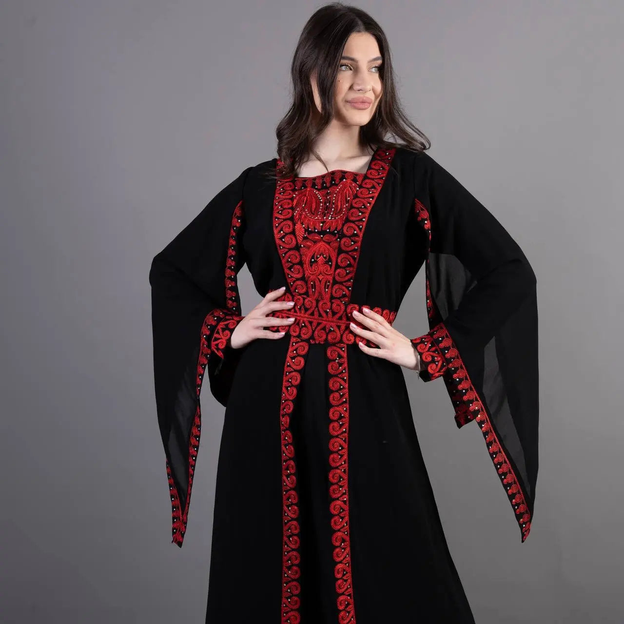 Palestinian Elegance traditional embroidery kaftan in black with red detailed embroidery and flowing sleeves