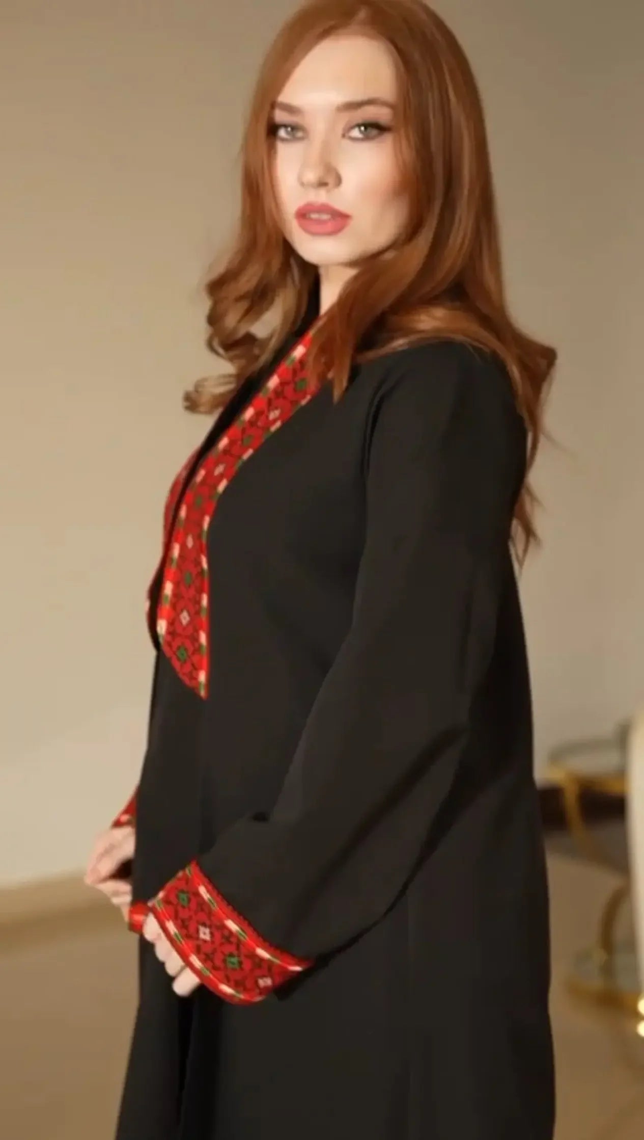 Palestinian Elegance black formal suit with red traditional embroidery suit details on collar and cuffs