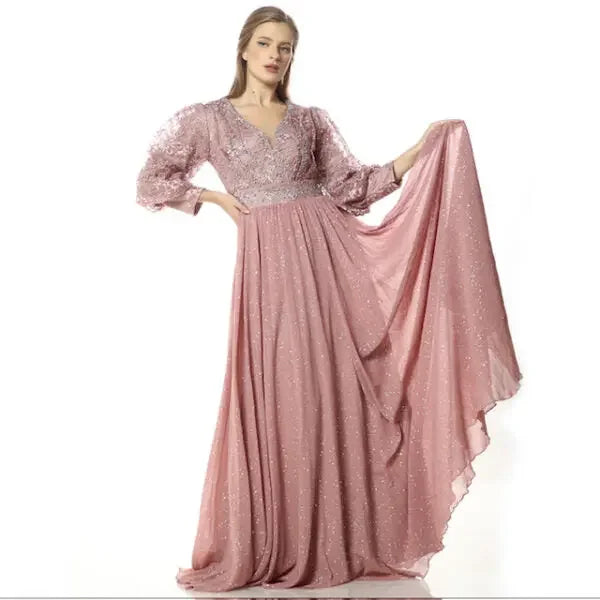 Palestinian Elegance pink floor-length unique fancy dress for parties with long sleeves and intricate lace