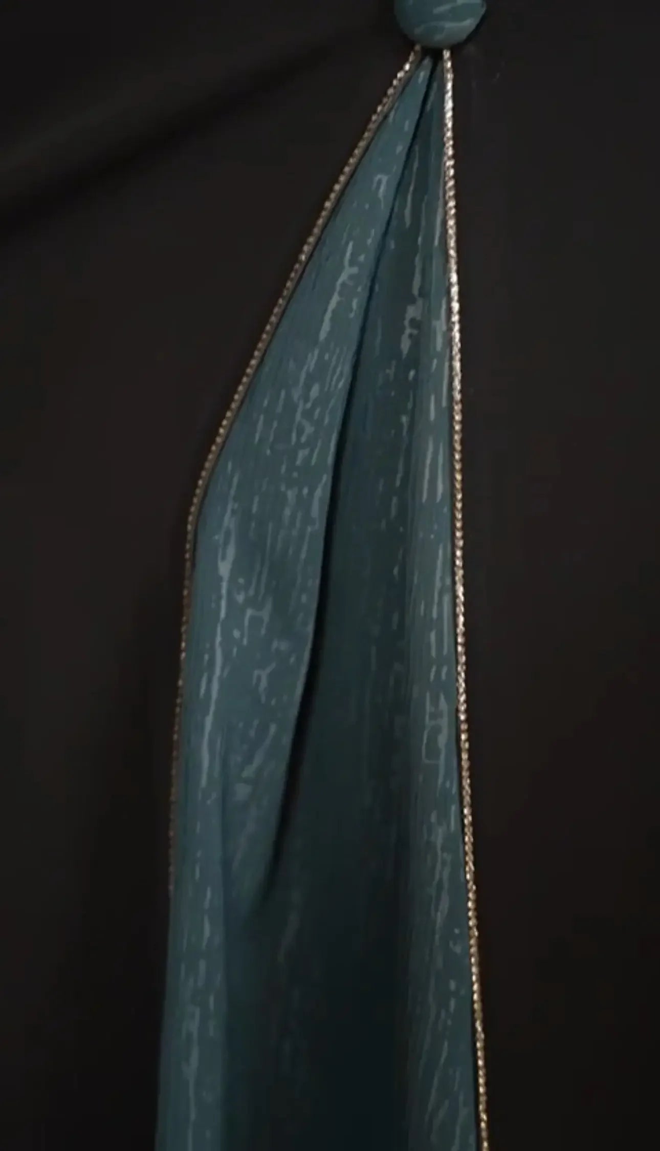 Palestinian Elegance elegant abaya for women with detailed edging and fabric texture