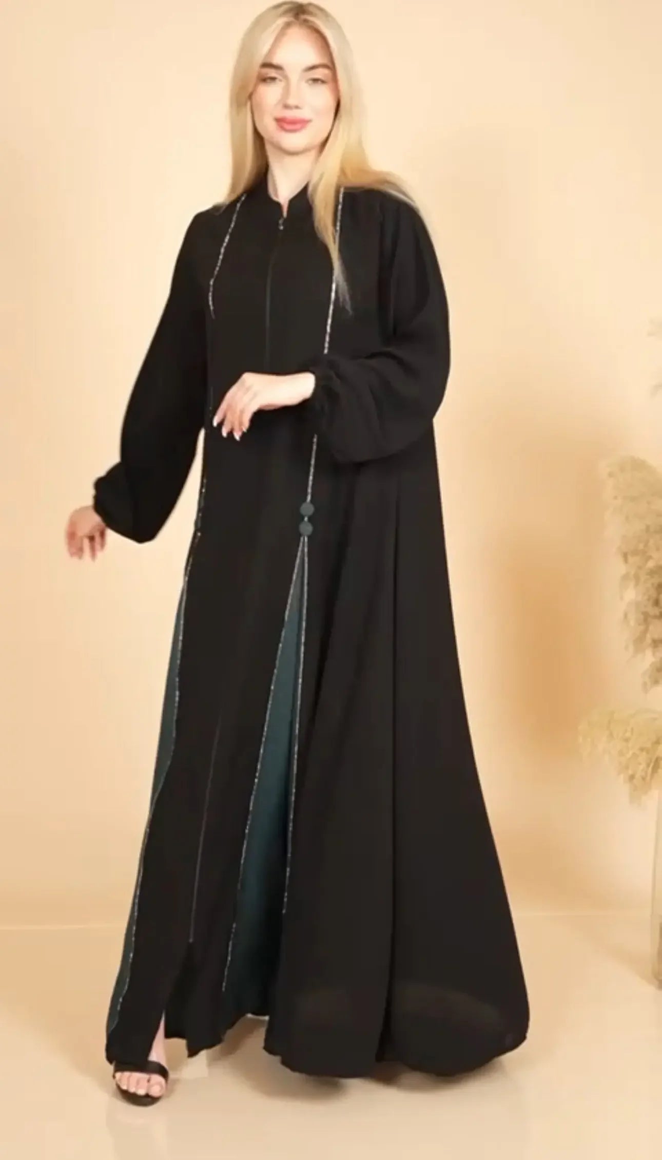 Palestinian Elegance black elegant abaya for women with long sleeves and decorative detailing