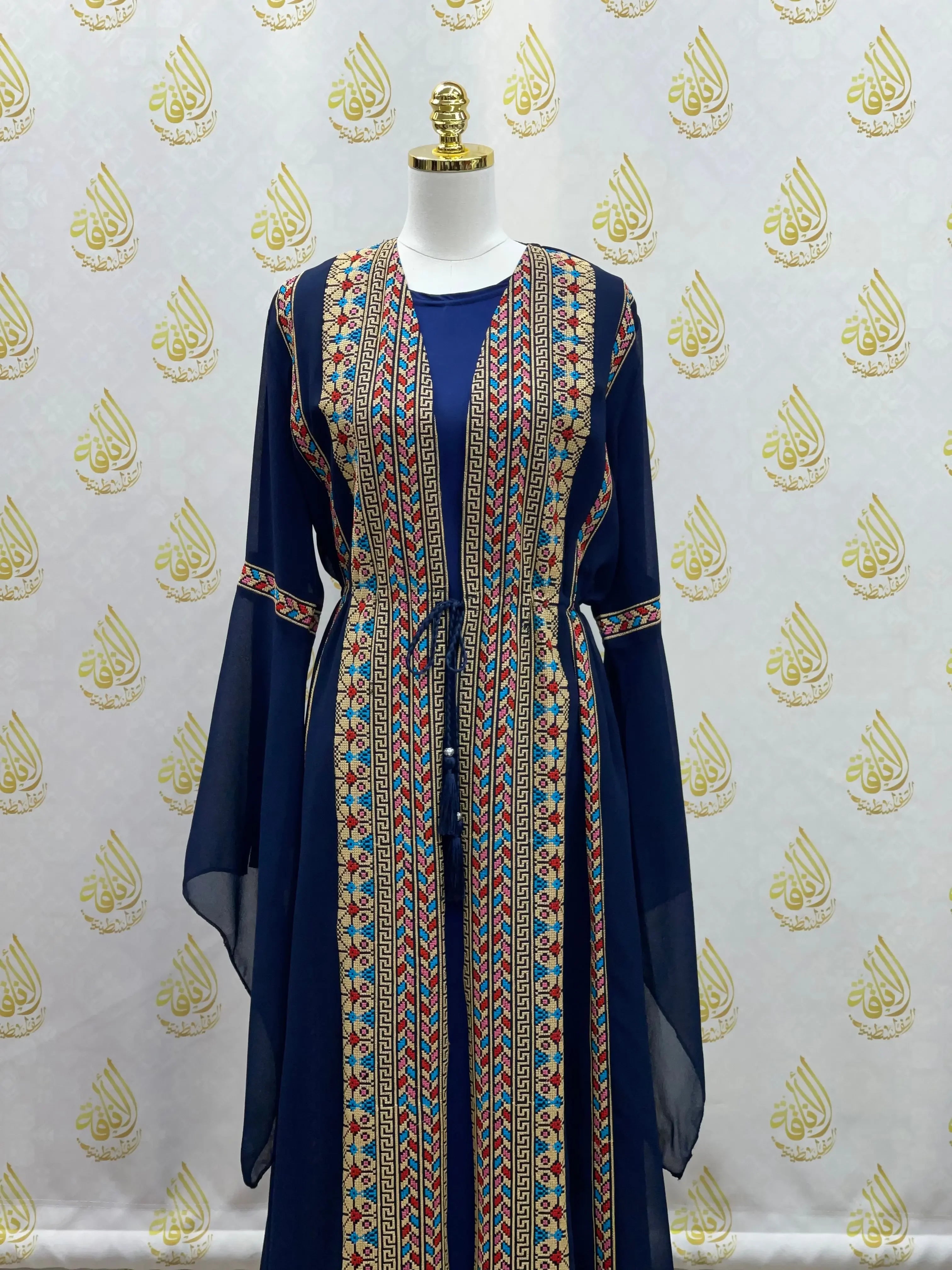 Palestinian Elegance embroidered chiffon set in navy with intricate traditional embroidery on front and sleeves
