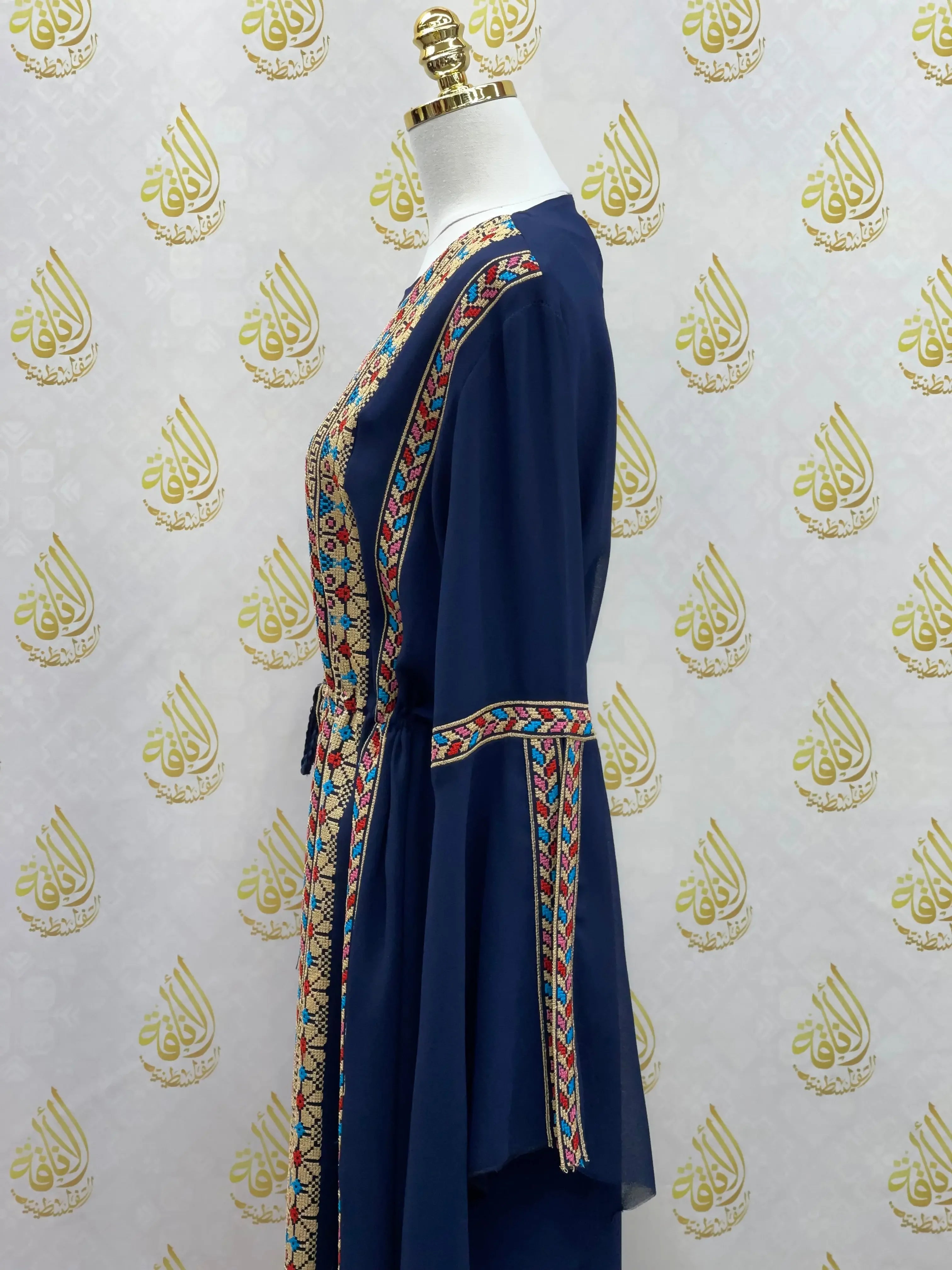 Palestinian Elegance embroidered chiffon set in navy blue with traditional colorful embroidery details