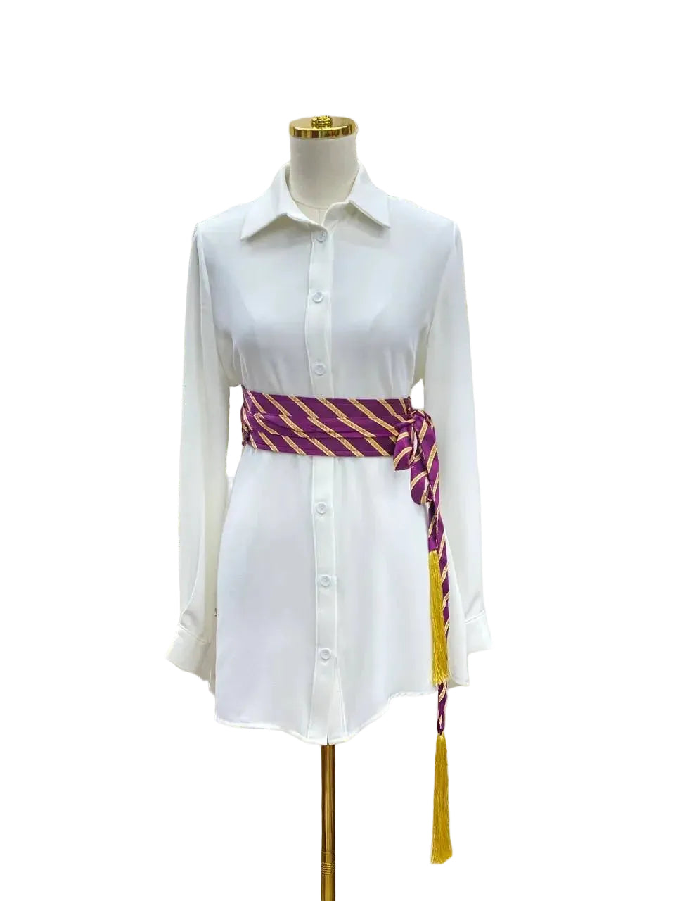 White shirt dress styled with purple and gold embroidered kashmir belt tied around the waist