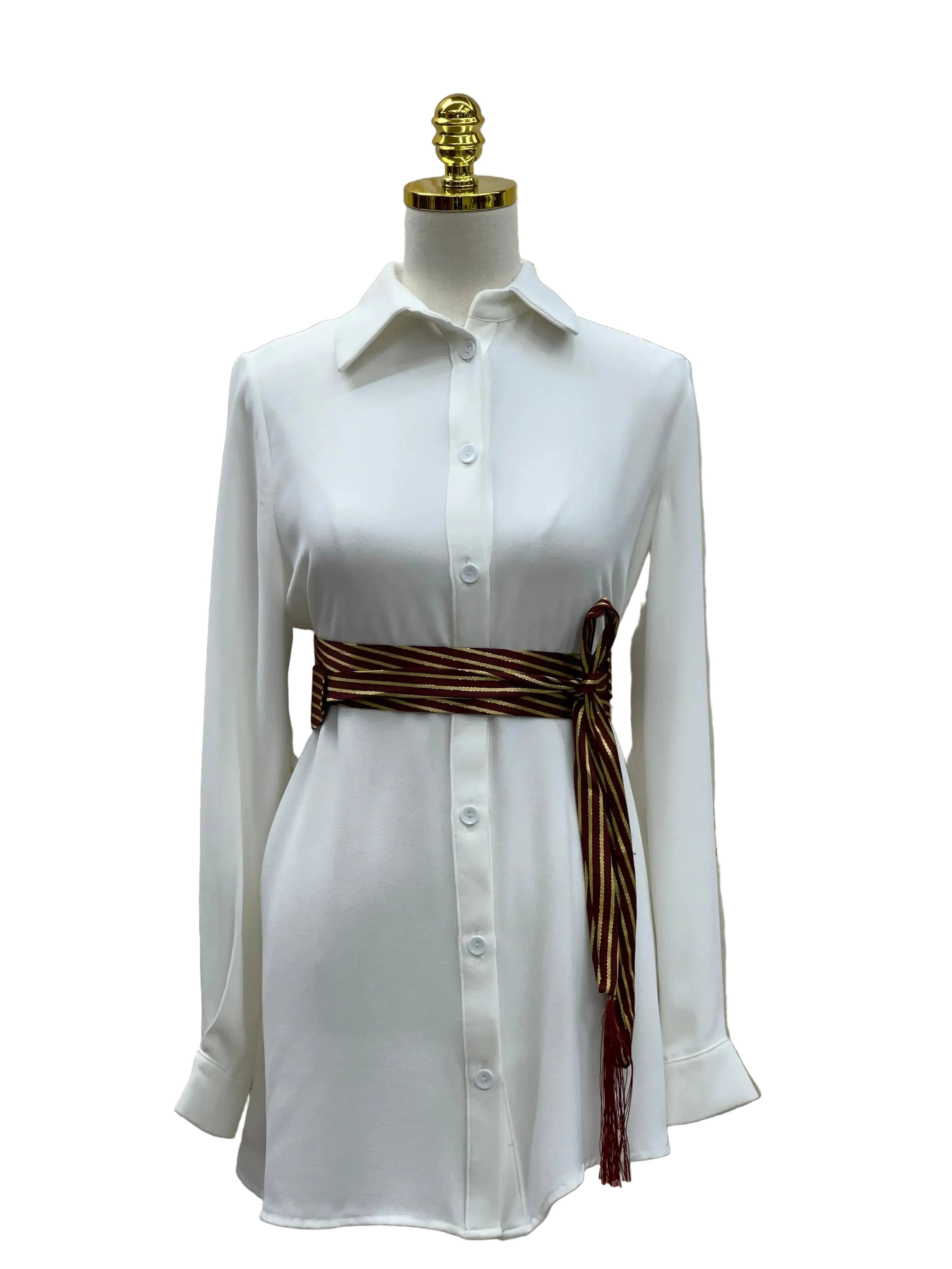 White long sleeve shirt dress with striped embroidered saya belt tied at the waist by Palestinian Elegance