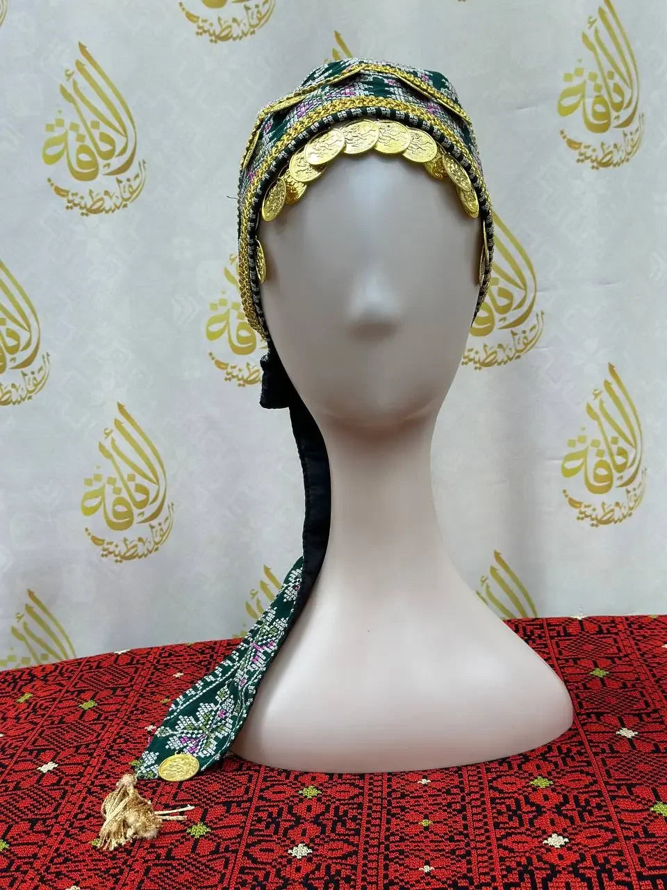 Palestinian Elegance kids tatreez headpiece with traditional embroidery and gold coin accents on mannequin