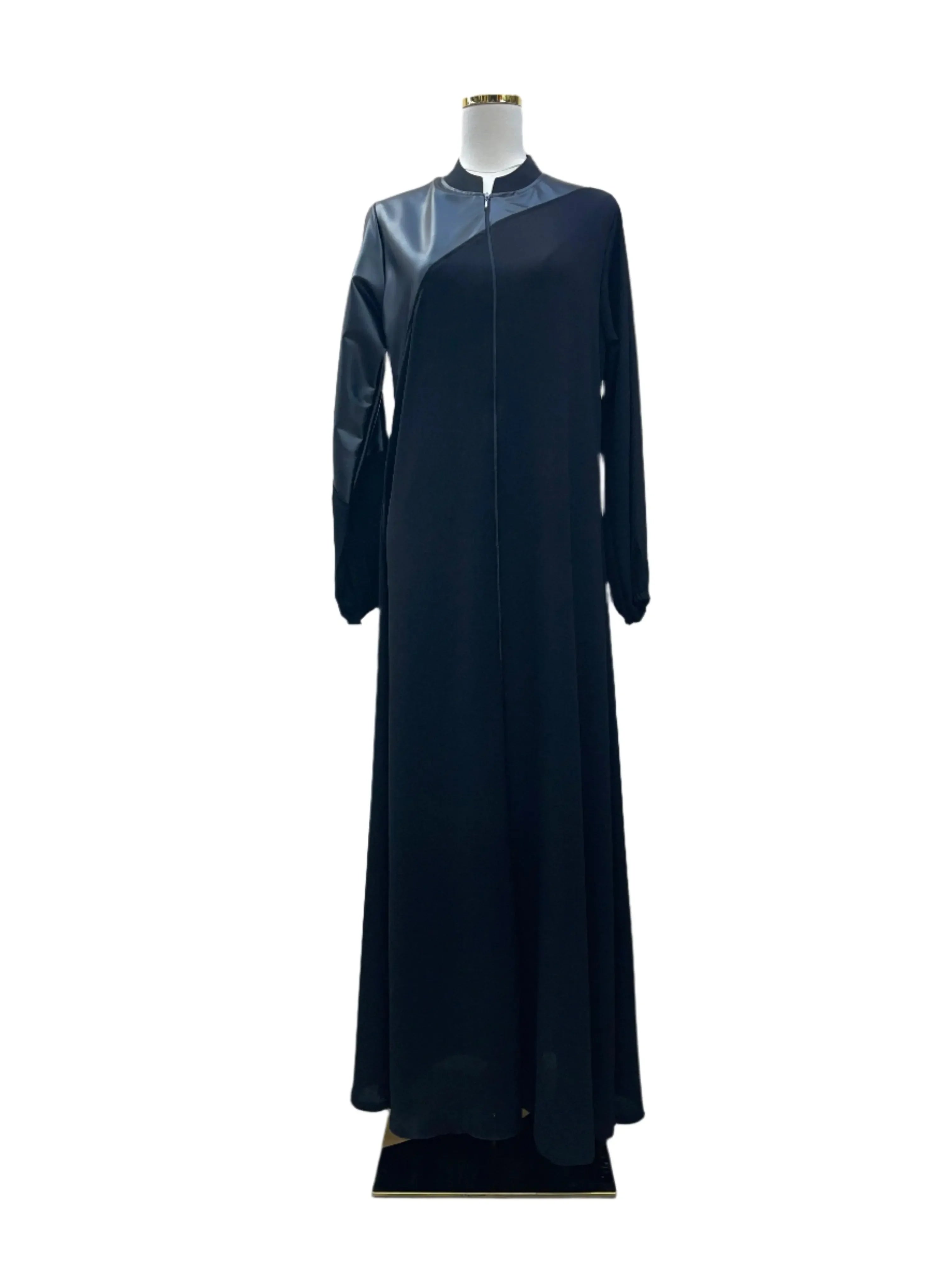 Luxury women leather abaya in black with sleek design by Palestinian Elegance on mannequin