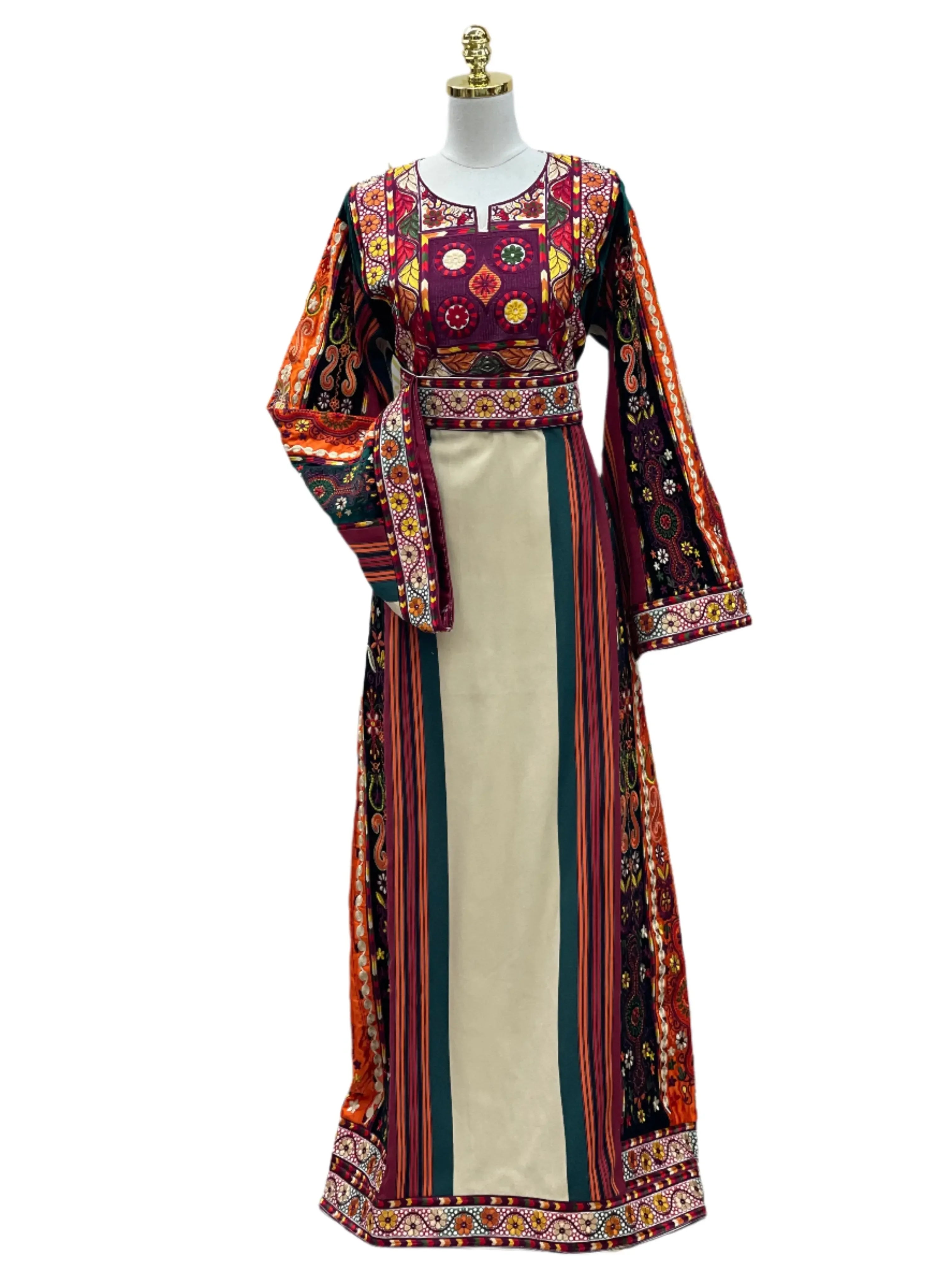 Palestinian embroidered thoub dress with colorful traditional embroidery and long sleeves on mannequin