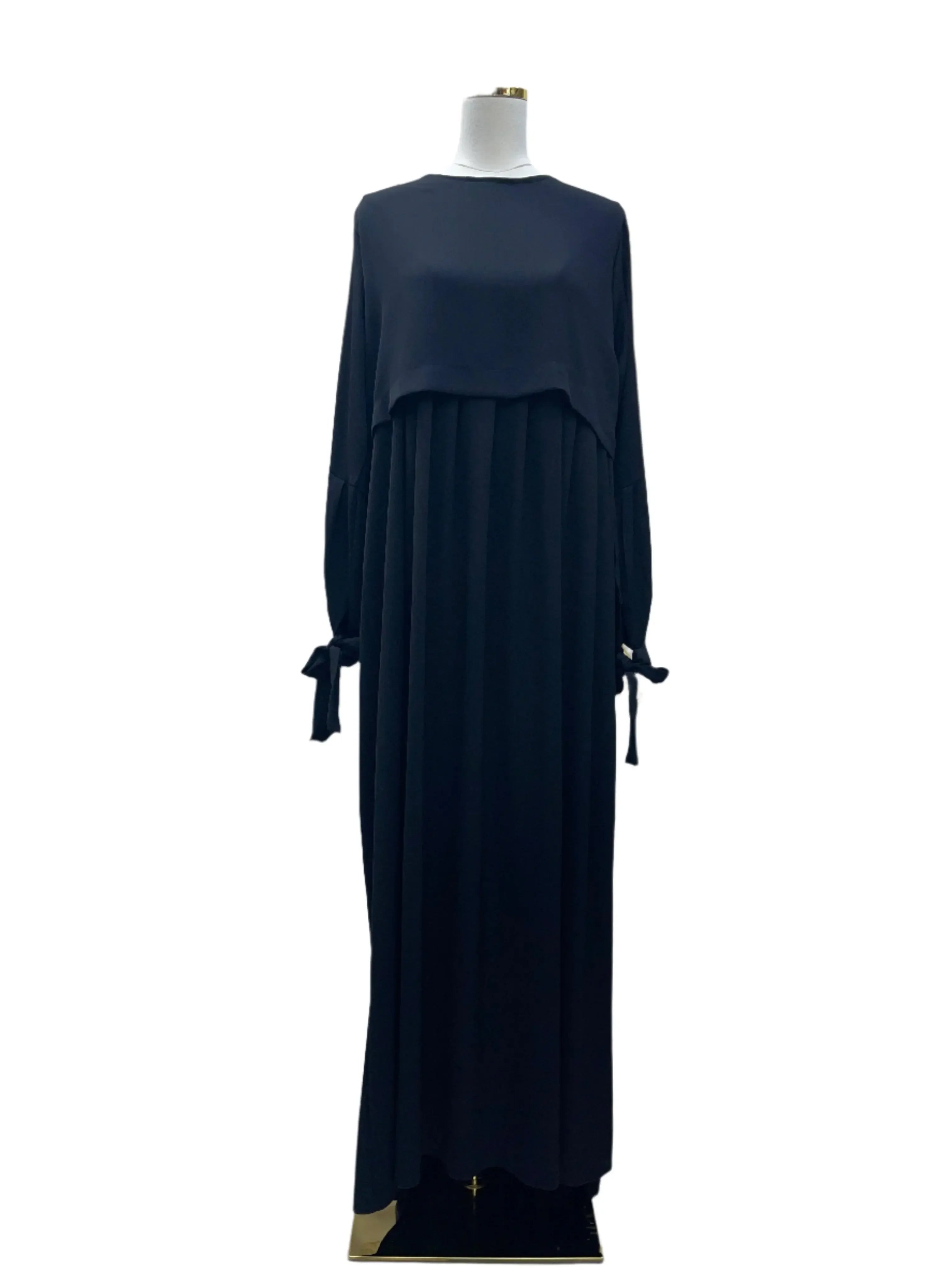 Palestinian Elegance plain black abaya with long sleeves and bow tie details on cuffs