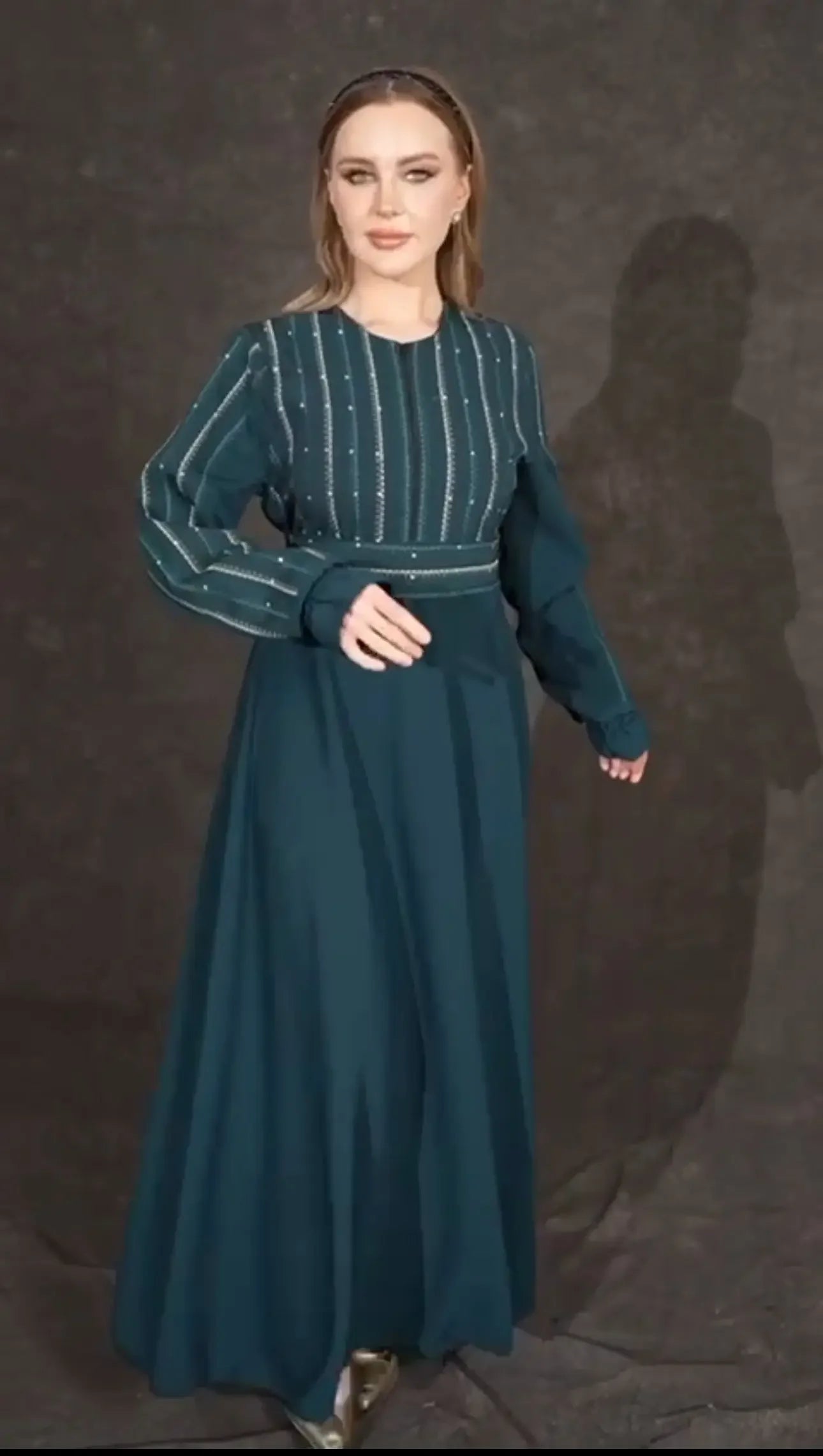 Palestinian Elegance versatile abaya dress in dark green with long sleeves and embroidered bodice