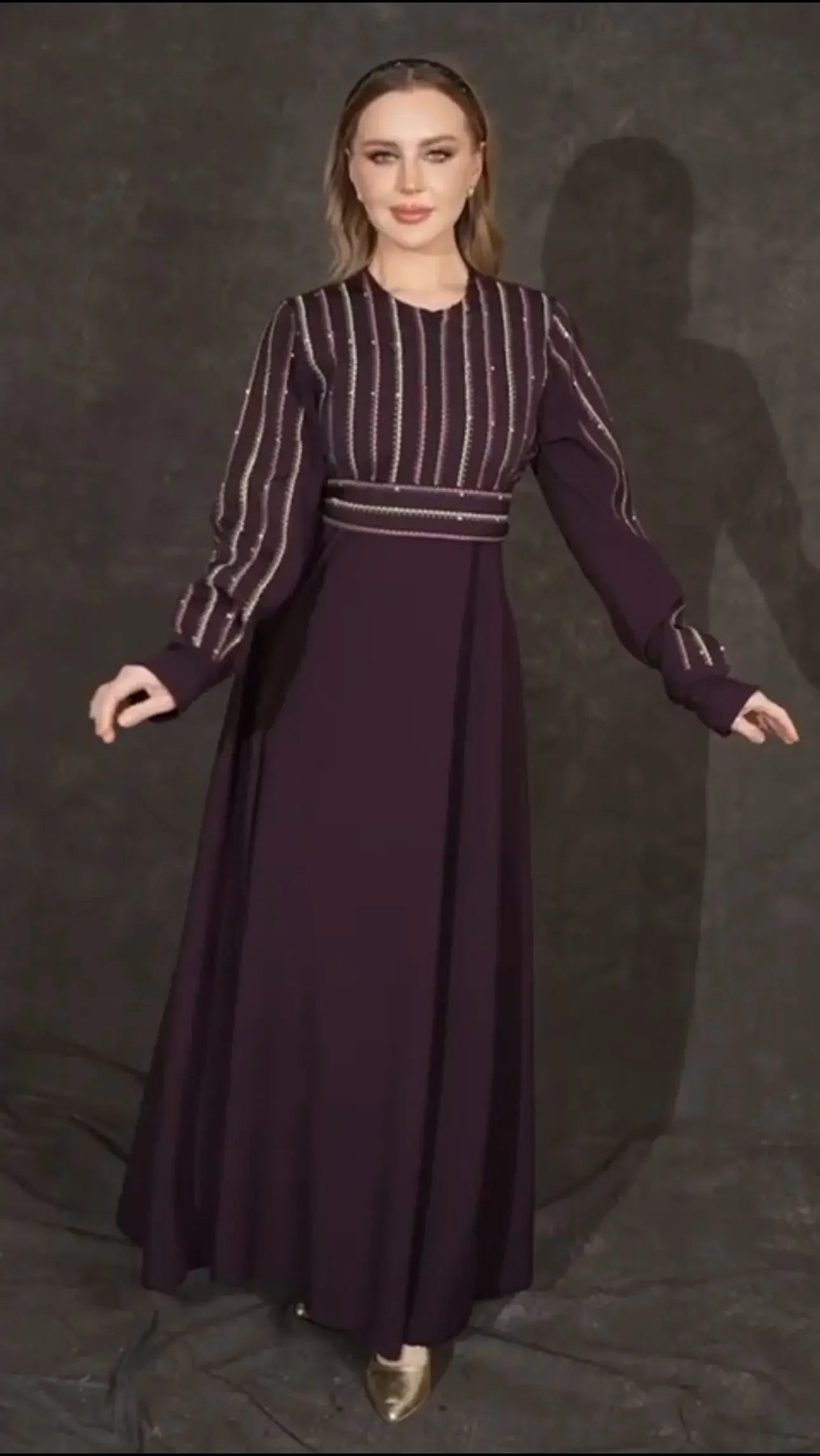 Palestinian Elegance versatile abaya dress in deep purple with striped upper bodice and long sleeves