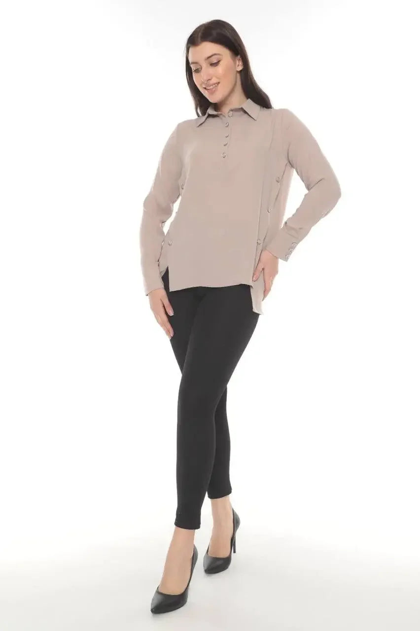 Palestinian Elegance versatile chic blouse in beige worn with black pants and black heels