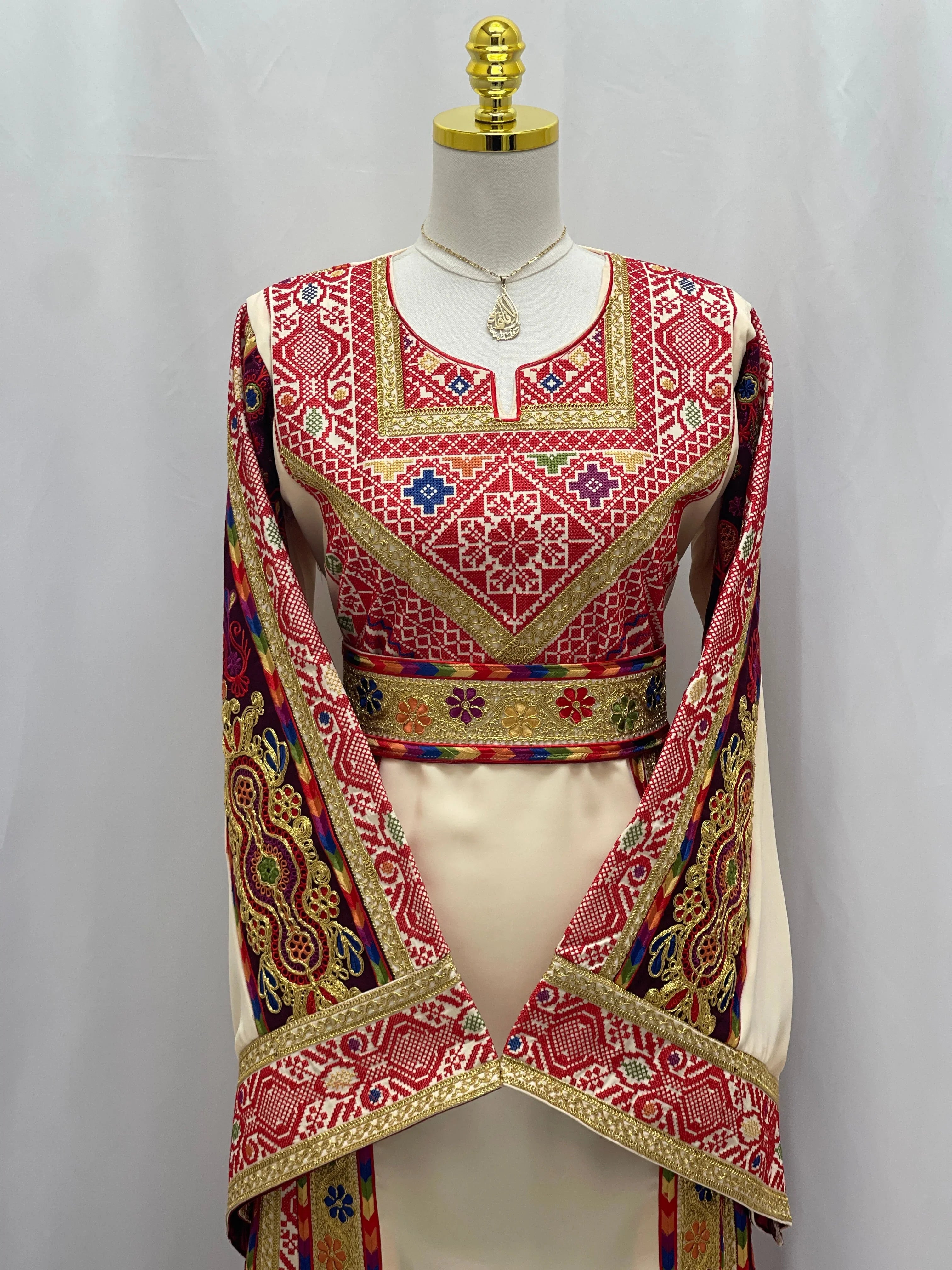 Al Kananiyyah Embroidered Thobe with intricate patterns and vibrant colors for elegant style