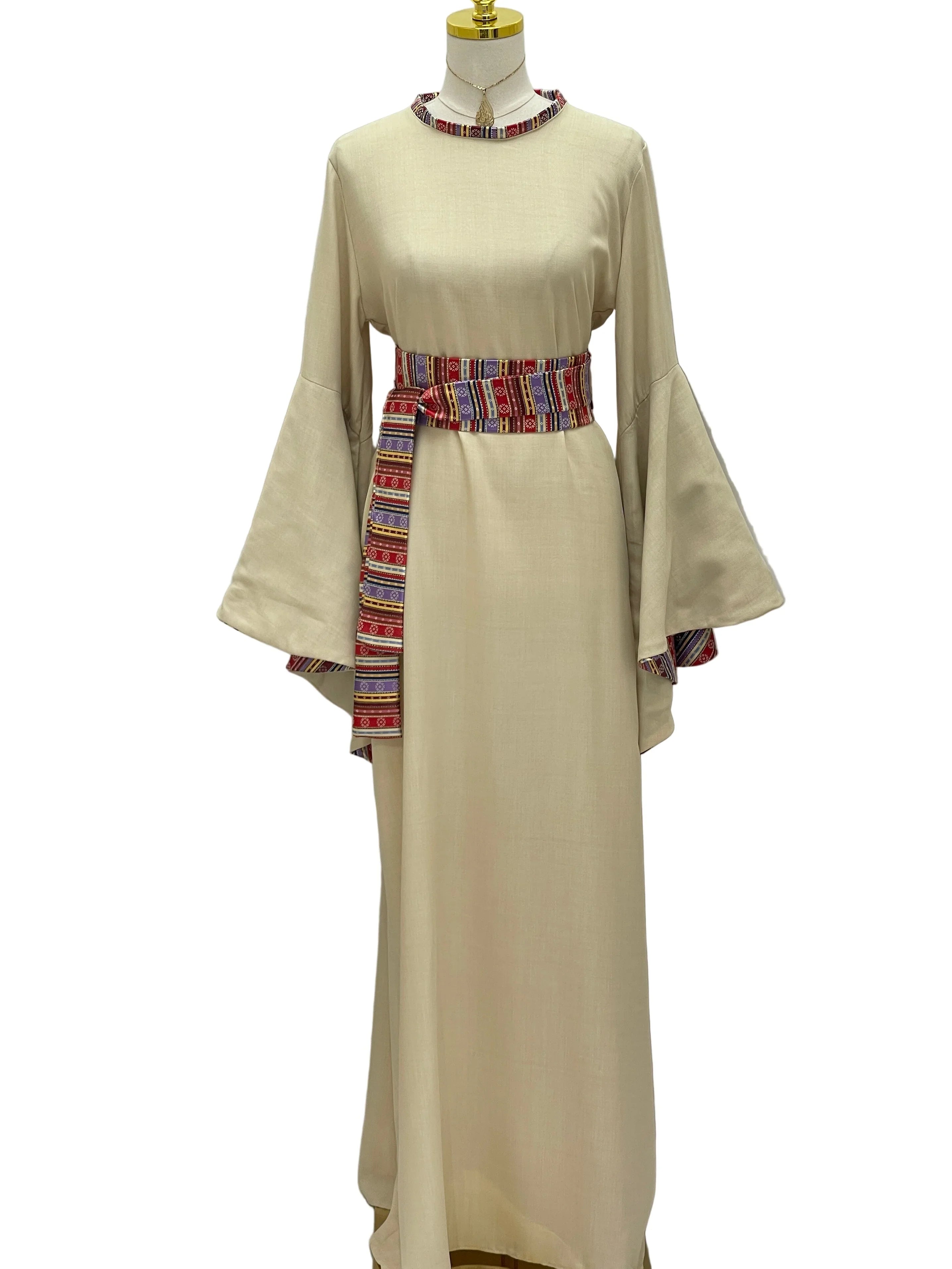 Beige Al-Mais Thobe featuring embroidered bell sleeves and decorative belt for elegant style